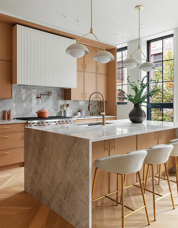 537 Pacific Street Brooklyn, NY 11217 - Photo 5 of 25 a kitchen with a table chairs sink and cabinets