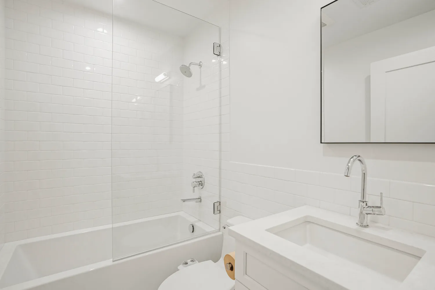 a view of a room with gym equipment and windows