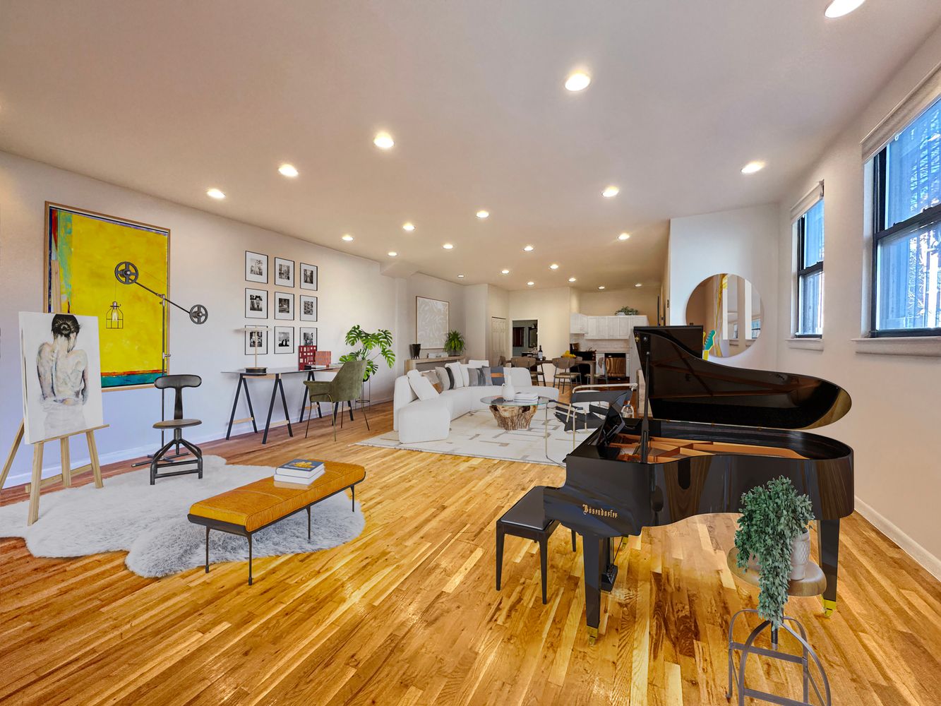 a living room with furniture and a wooden floor