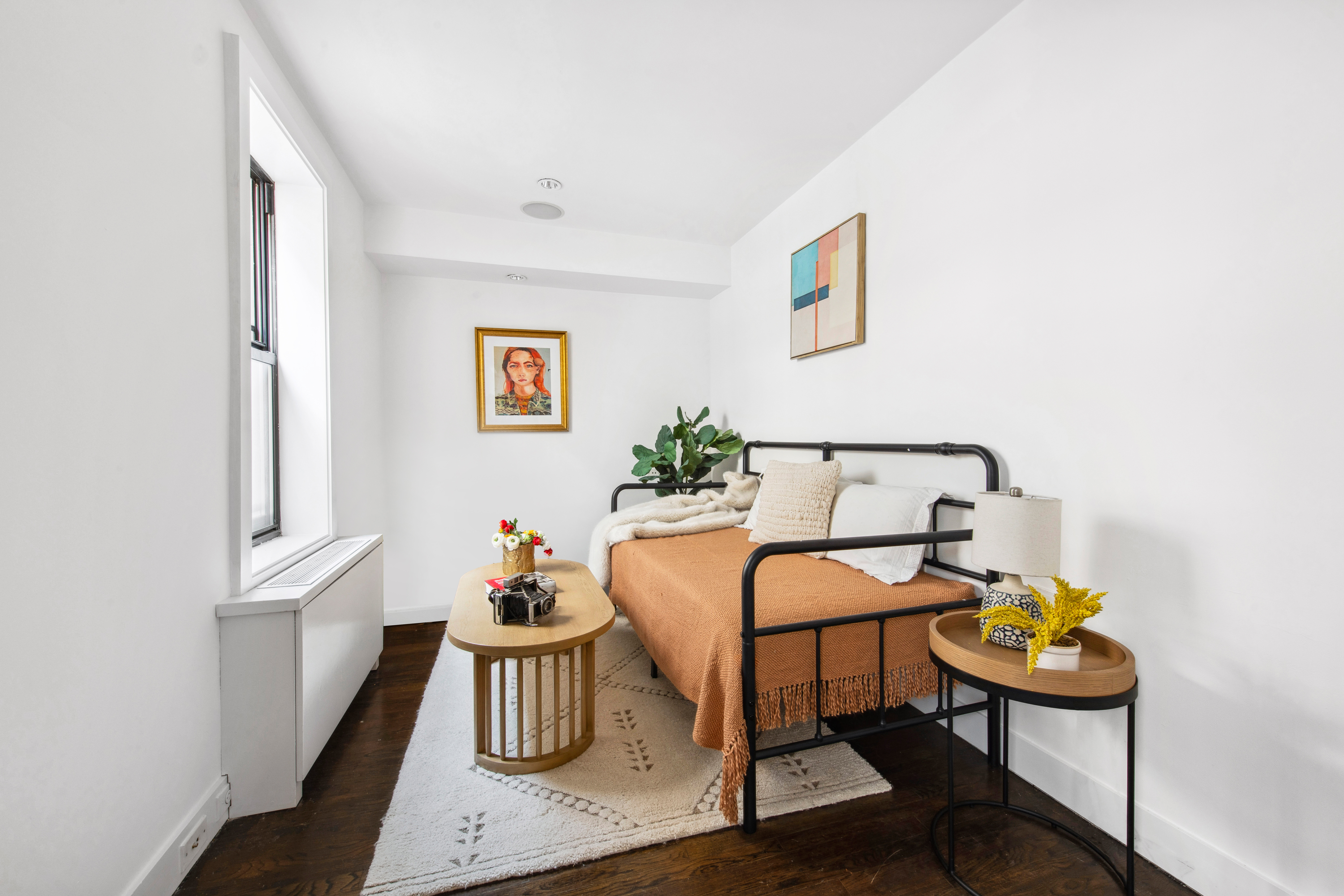 330 East 70th Street, Unit 5AB Manhattan, NY 10021 - Photo 11 of 13 a bed room with furniture and a chair