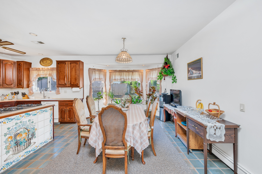 35 Poe Street Staten Island, NY 10307 - Photo 13 of 36 a dining room with furniture and window