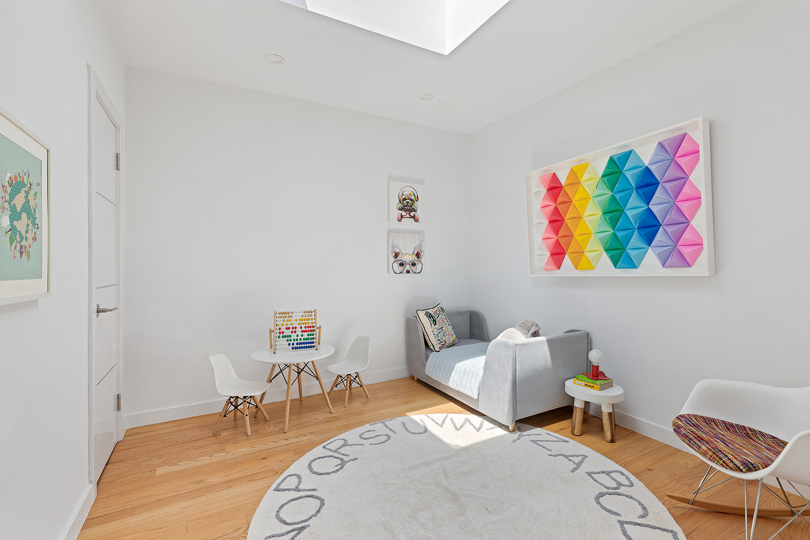 171 13th Street Brooklyn, NY 11215 - Photo 9 of 17 a bedroom with furniture and a wooden floor