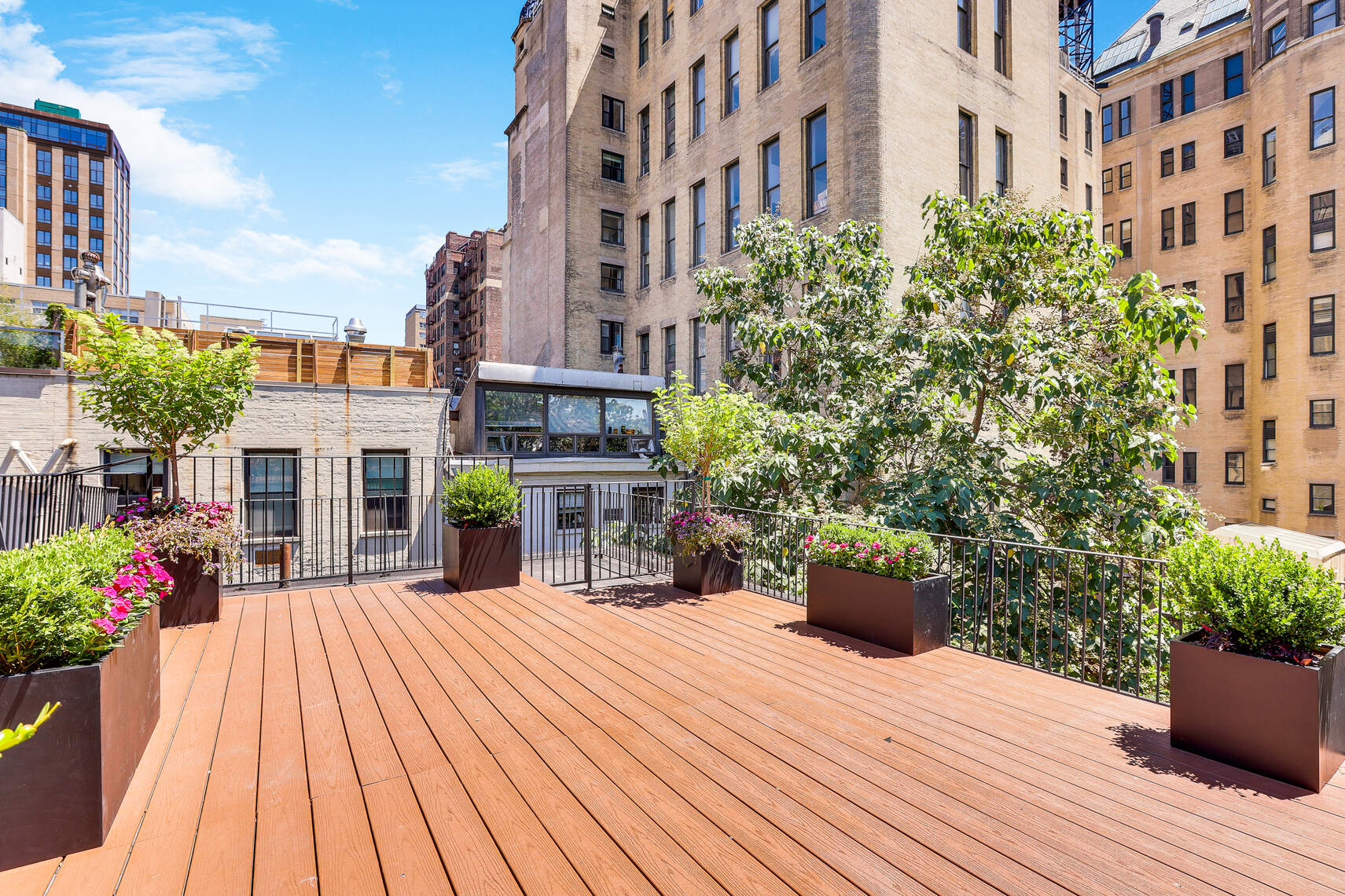 237 East 17th Street, Unit 520 Manhattan, NY 10003 - Photo 2 of 14 a view of a building with potted plants