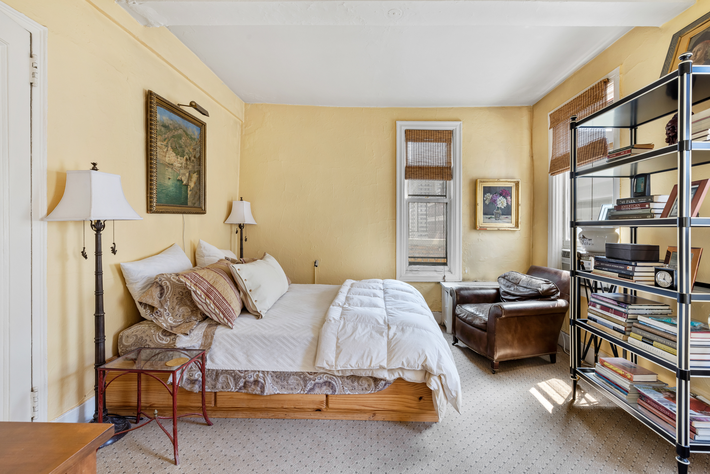 105 East 38th Street, Unit PH10 Manhattan, NY 10016 - Photo 8 of 11 a bedroom with a bed and a window
