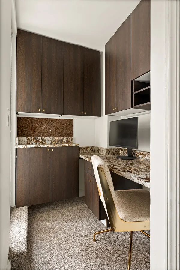 a kitchen with a stove and a microwave