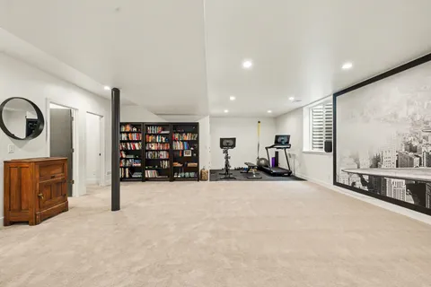 a view of a livingroom with furniture and garage