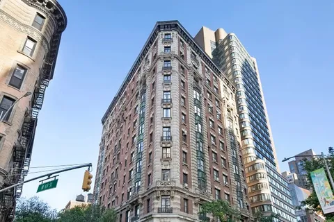 a street sign that is on a wall