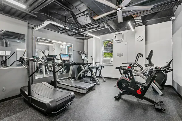 a view of a room with gym equipment