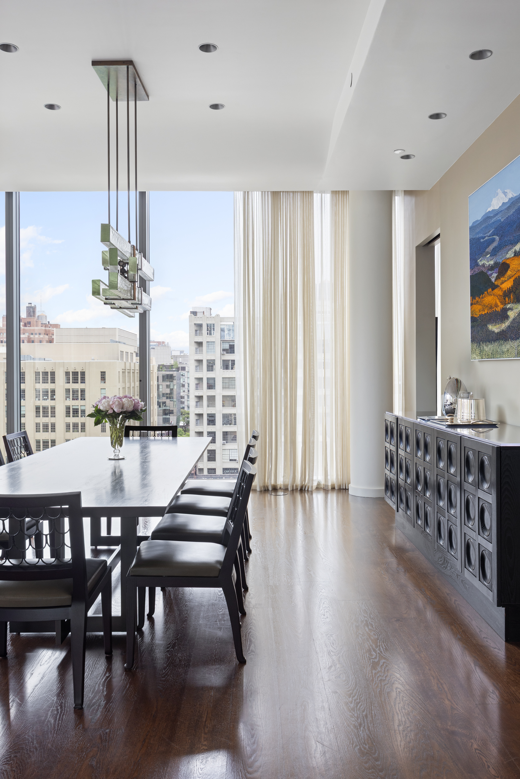 520 West 28th Street, Unit PH37 Manhattan, NY 10001 - Photo 15 of 45 a view of a dining room with furniture window and wooden floor