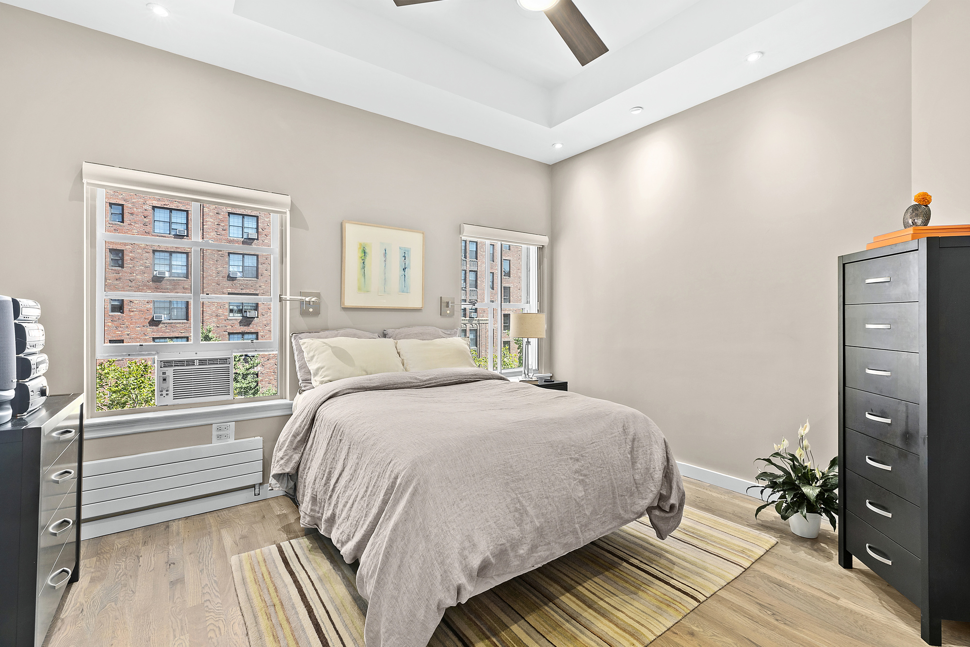 450 West 23rd Street, Unit E Manhattan, NY 10011 - Photo 5 of 12 a bedroom with a bed and a window