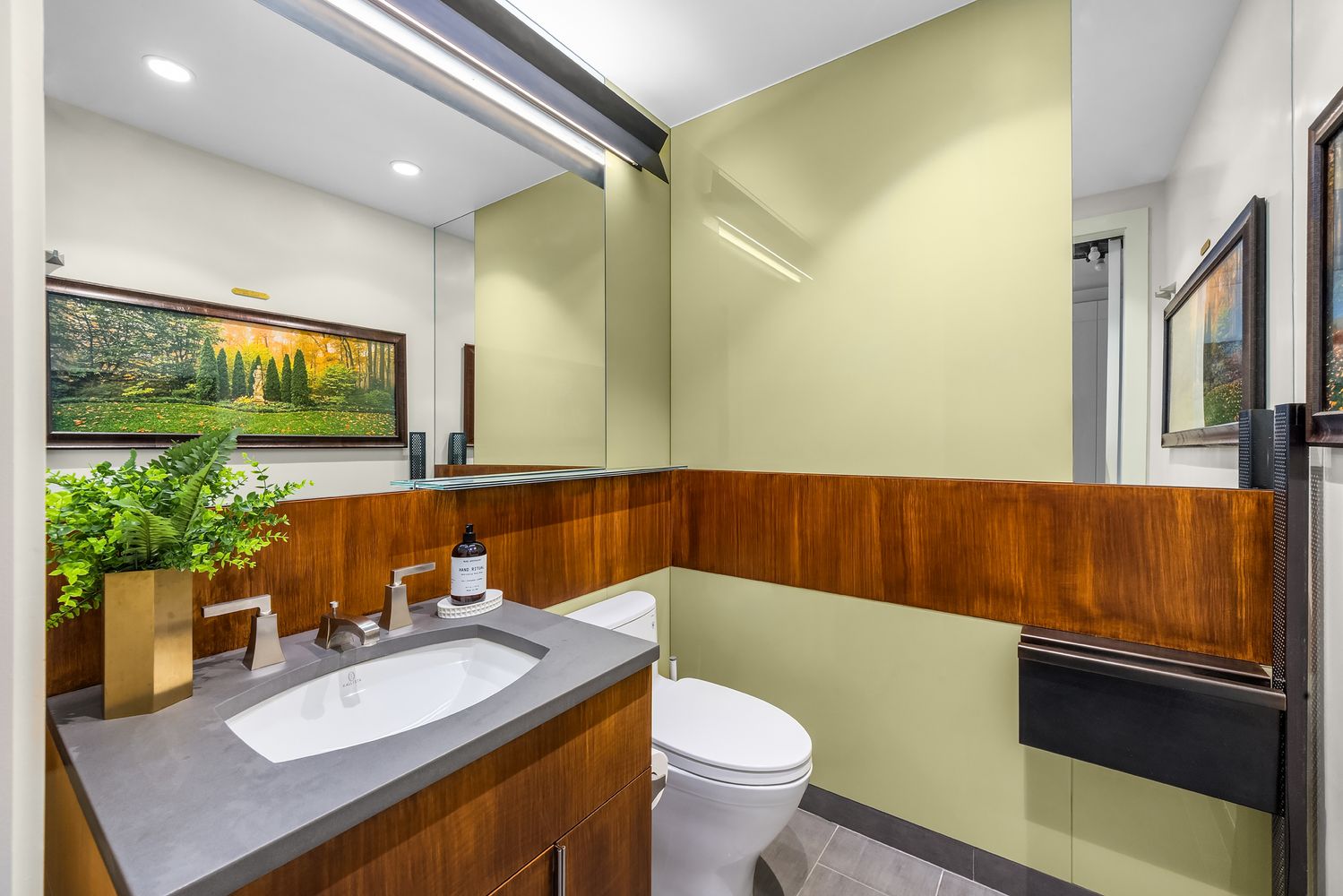 a view of a hallway with furniture and front door