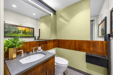 a view of a hallway with furniture and front door