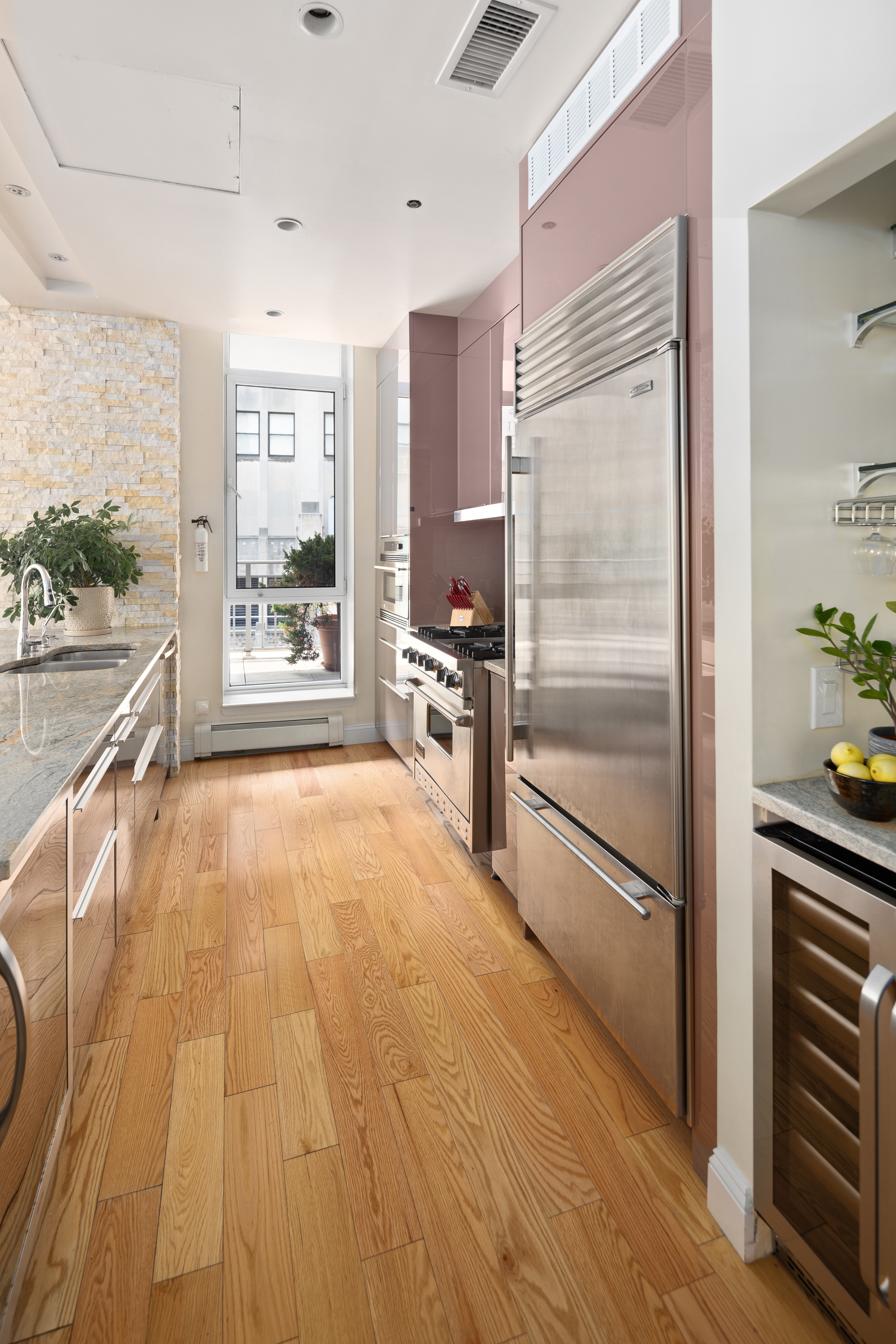 59 John Street, Unit PH1 Manhattan, NY 10038 - Photo 4 of 15 a bathroom with a bathtub and a shower