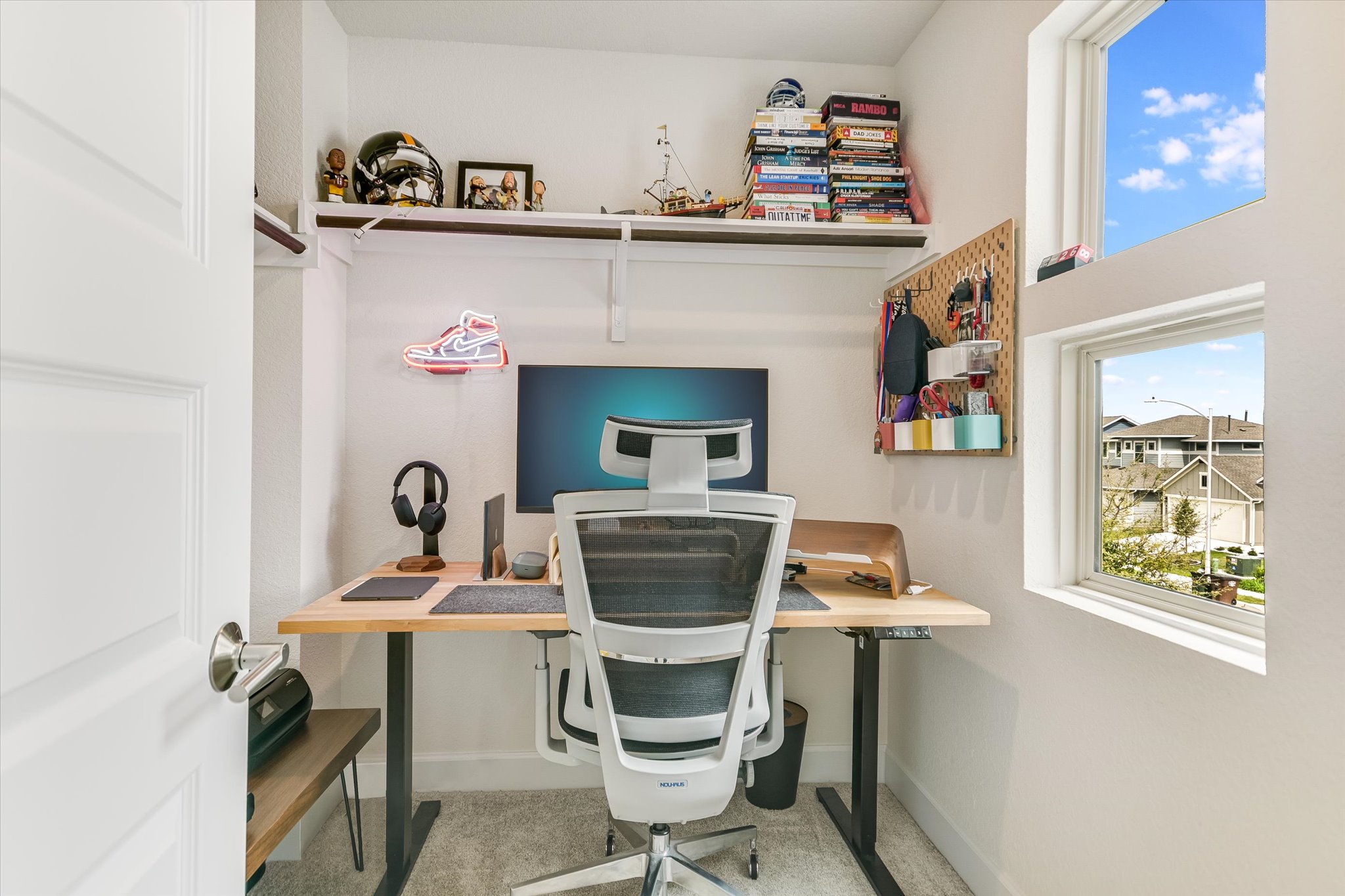 8607 McKamy Drive Austin, TX 78744 - Photo 20 of 28 a living room with furniture and a fireplace