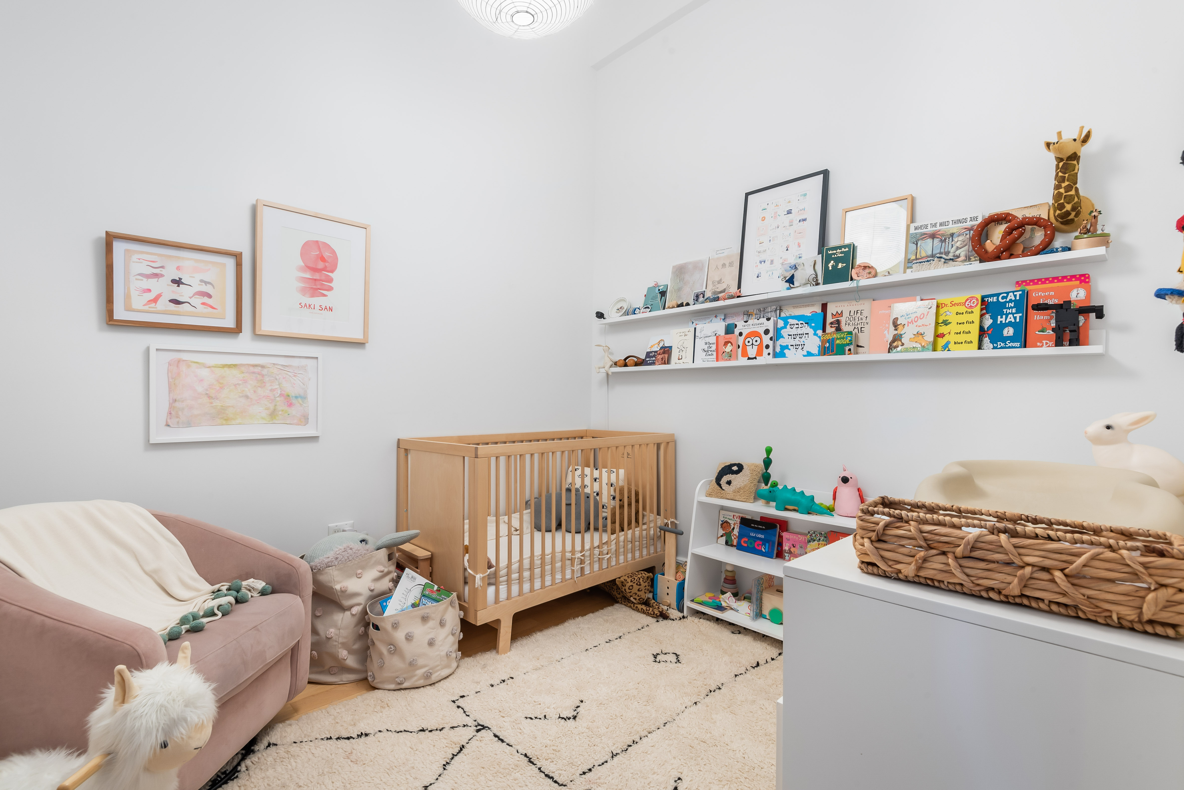 55 Berry Street, Unit 2B Brooklyn, NY 11249 - Photo 6 of 12 a bedroom with baby toys and baby crib