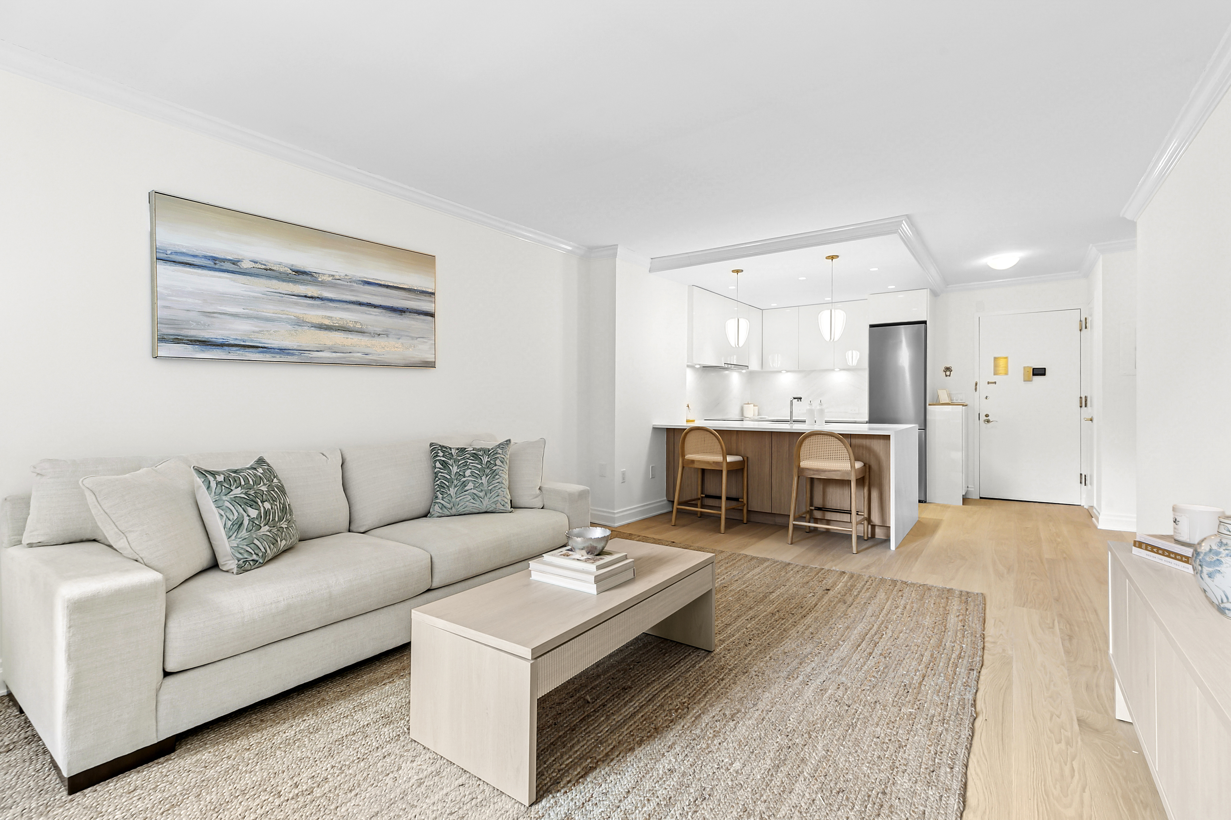 350 East 82nd Street, Unit 4C Manhattan, NY 10028 - Photo 2 of 13 a living room with furniture and a fireplace