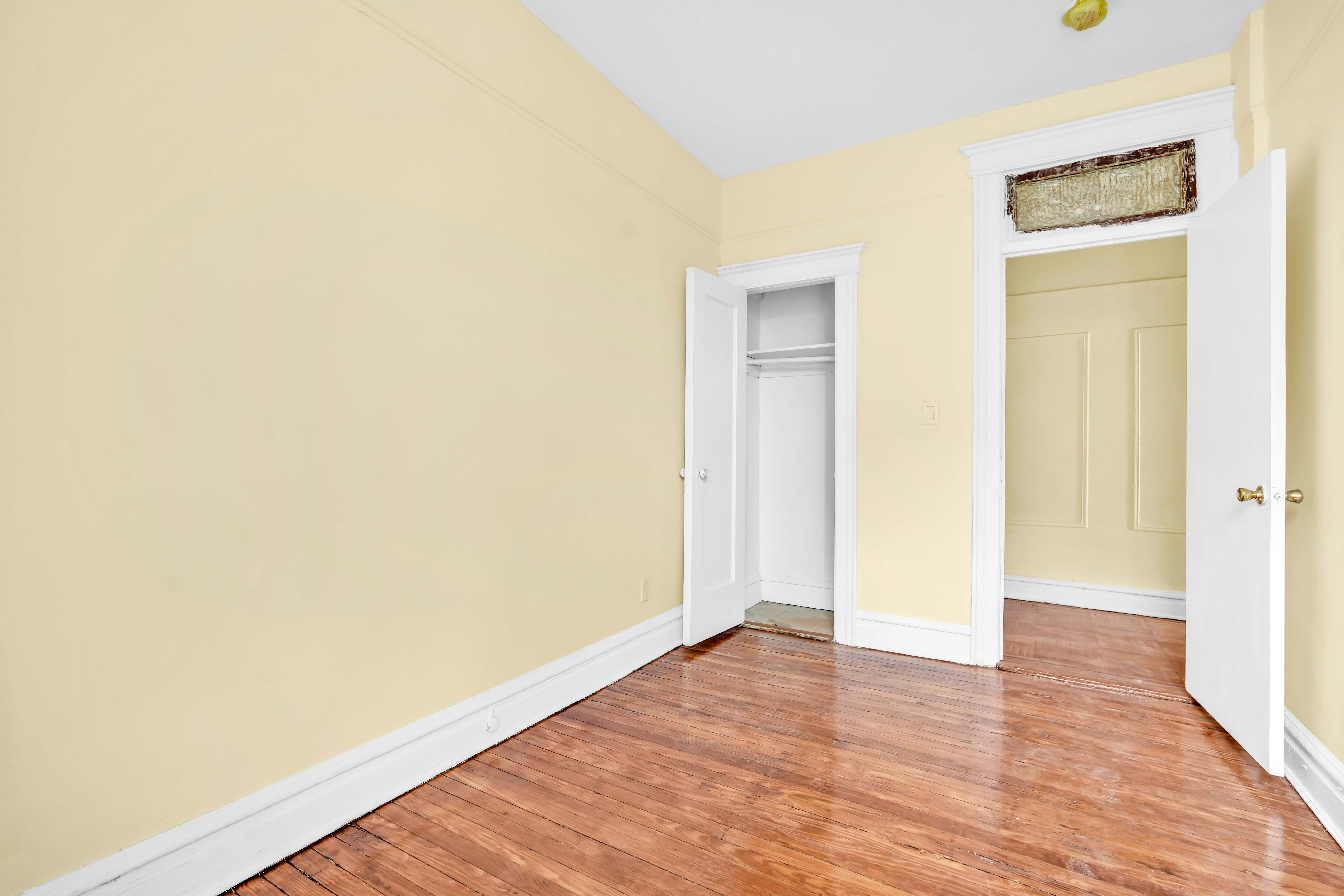 1770 Bedford Avenue Brooklyn, NY 11225 - Photo 25 of 50 a view of an empty room and wooden floor