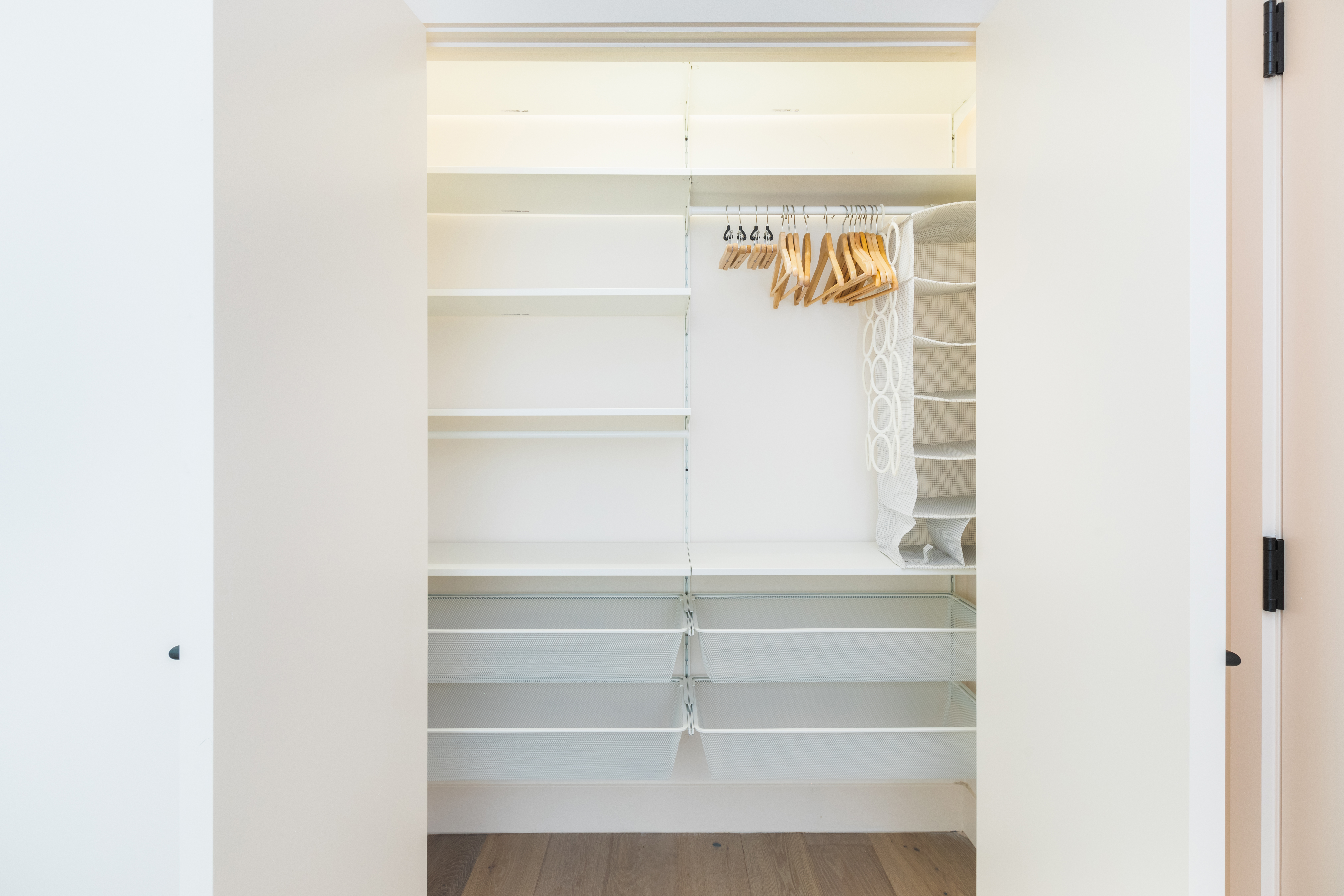 651 Leonard Street, Unit 1A Brooklyn, NY 11222 - Photo 9 of 12 a view of walk in closet with empty racks