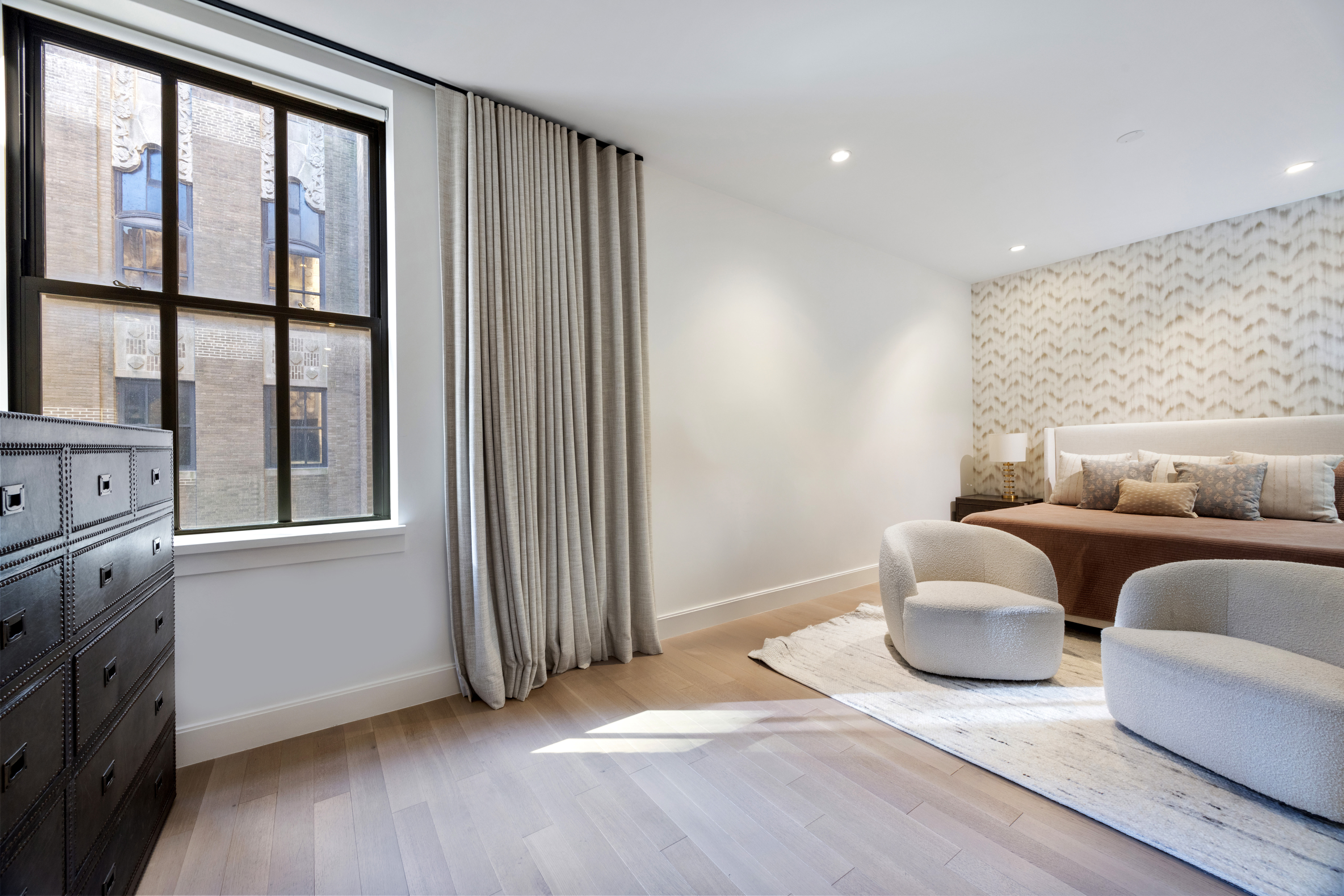 100 Barclay Street, Unit 16G Manhattan, NY 10007 - Photo 9 of 28 a living room with furniture and a window