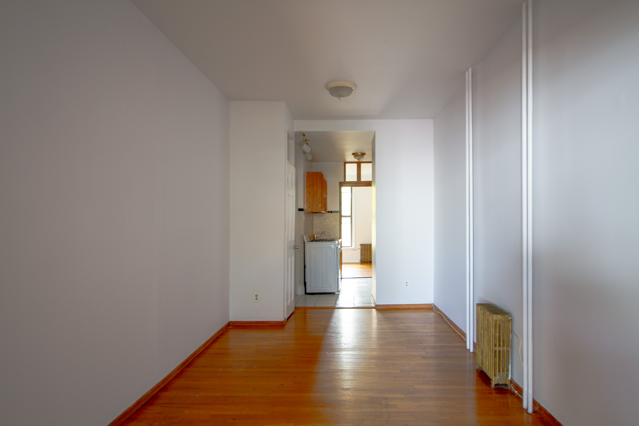312 Prospect Avenue, Unit 2R Brooklyn, NY 11215 - Photo 3 of 10 a view of hallway with wooden floor