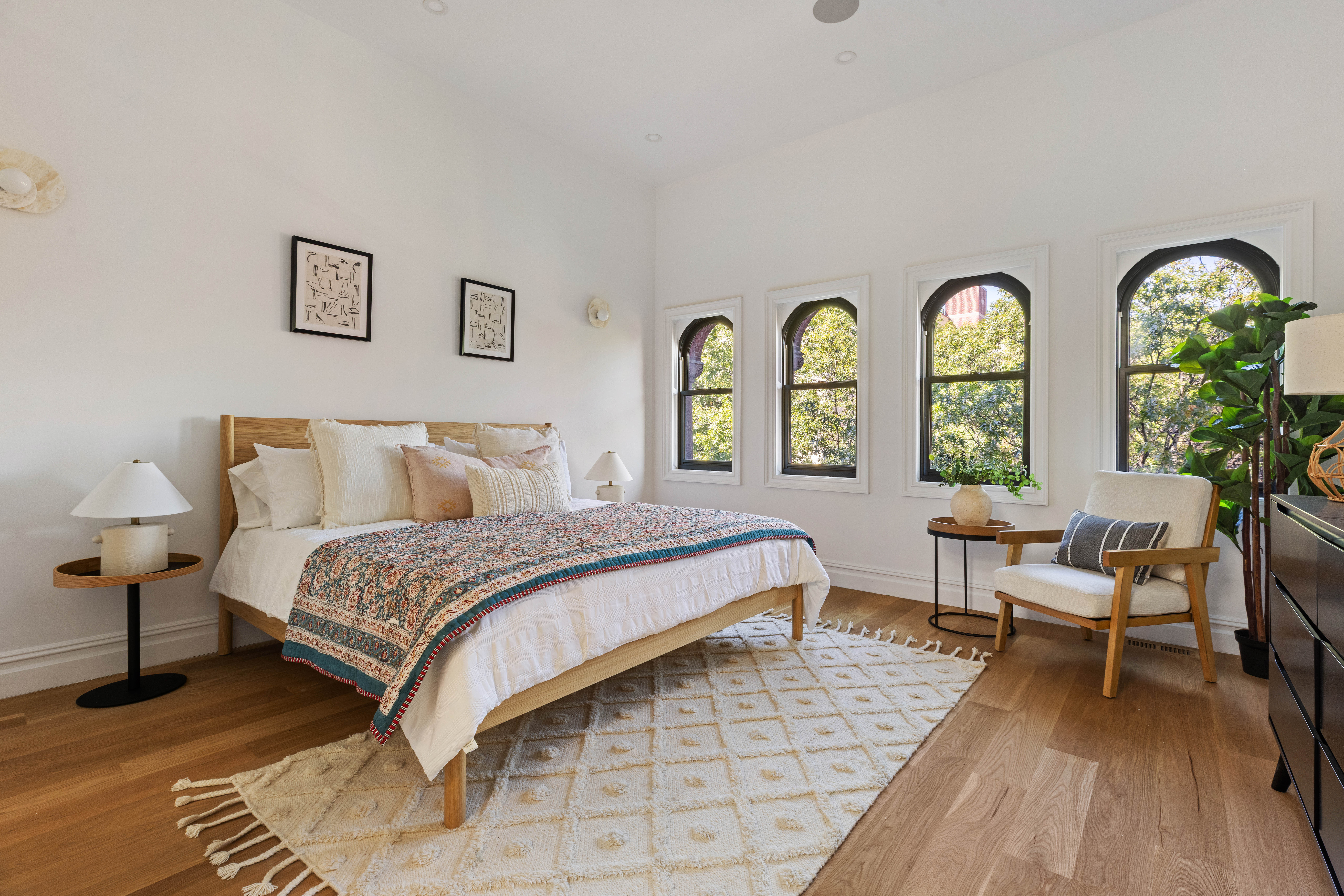 286 Dekalb Avenue Brooklyn, NY 11205 - Photo 9 of 17 a spacious bedroom with a bed and a table