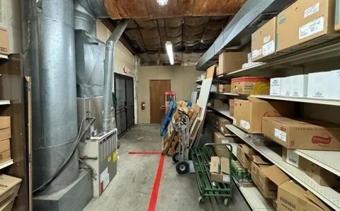 a view of a workspace with furniture