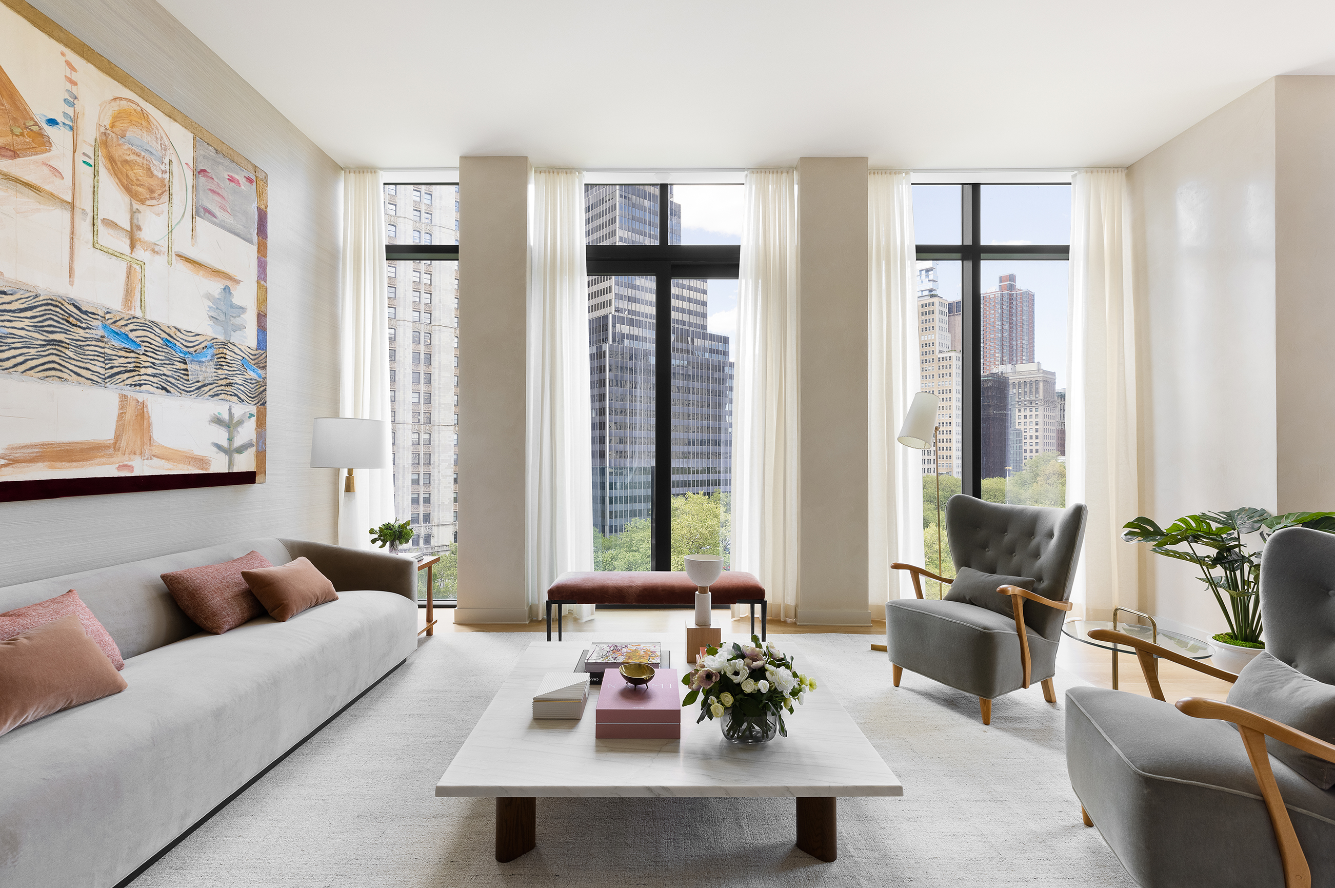 33 Park Row, Unit 6B Manhattan, NY 10038 - Photo 4 of 24 a living room with furniture and large windows