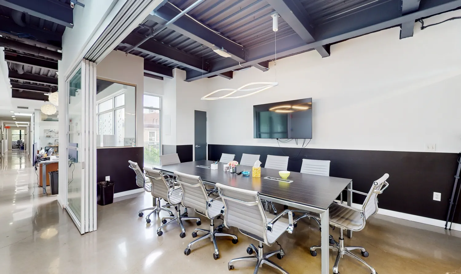 a view of an outdoor dining space with furniture