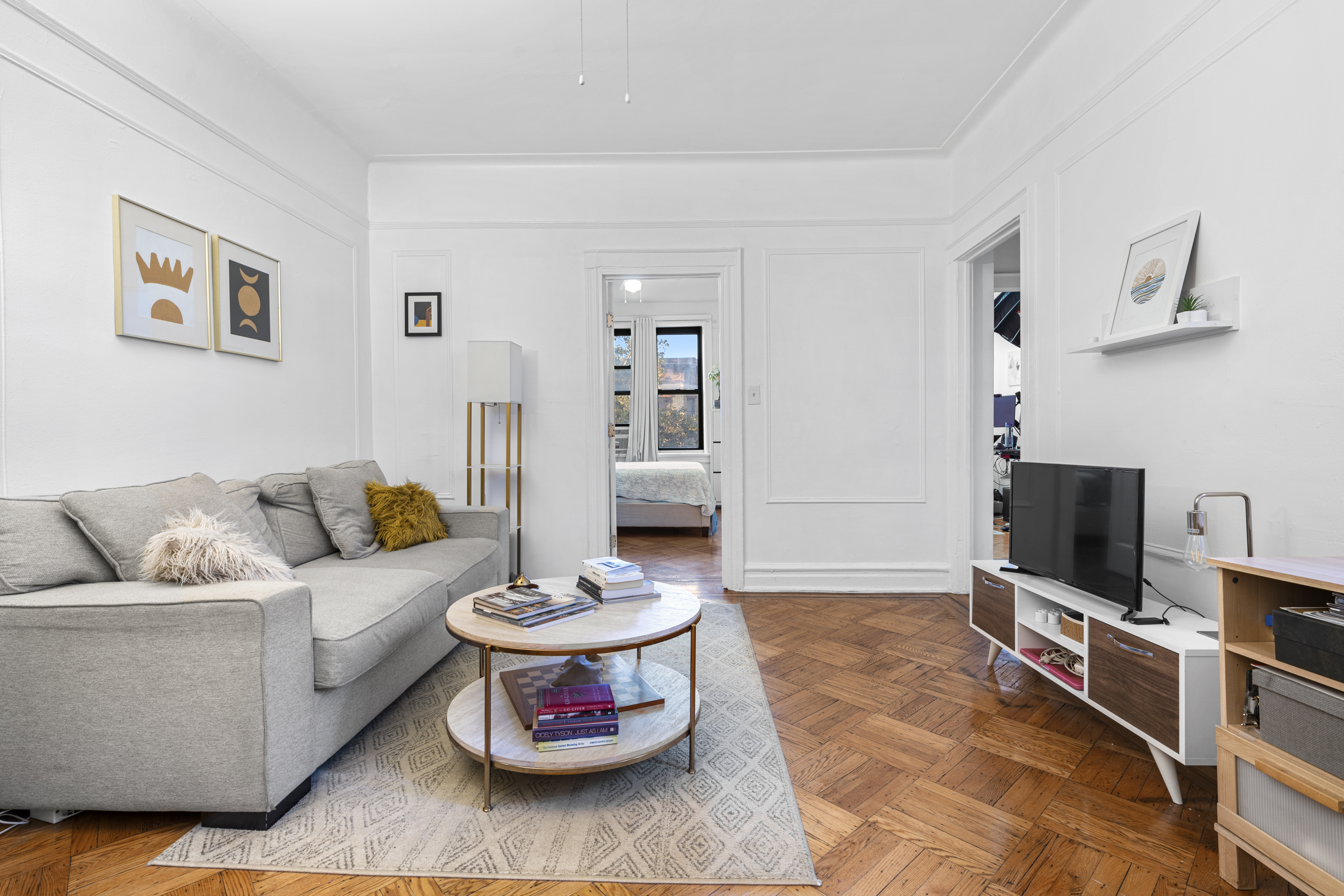 42 St Nicholas Avenue Brooklyn, NY 11237 - Photo 5 of 8 a living room with furniture and a flat screen tv