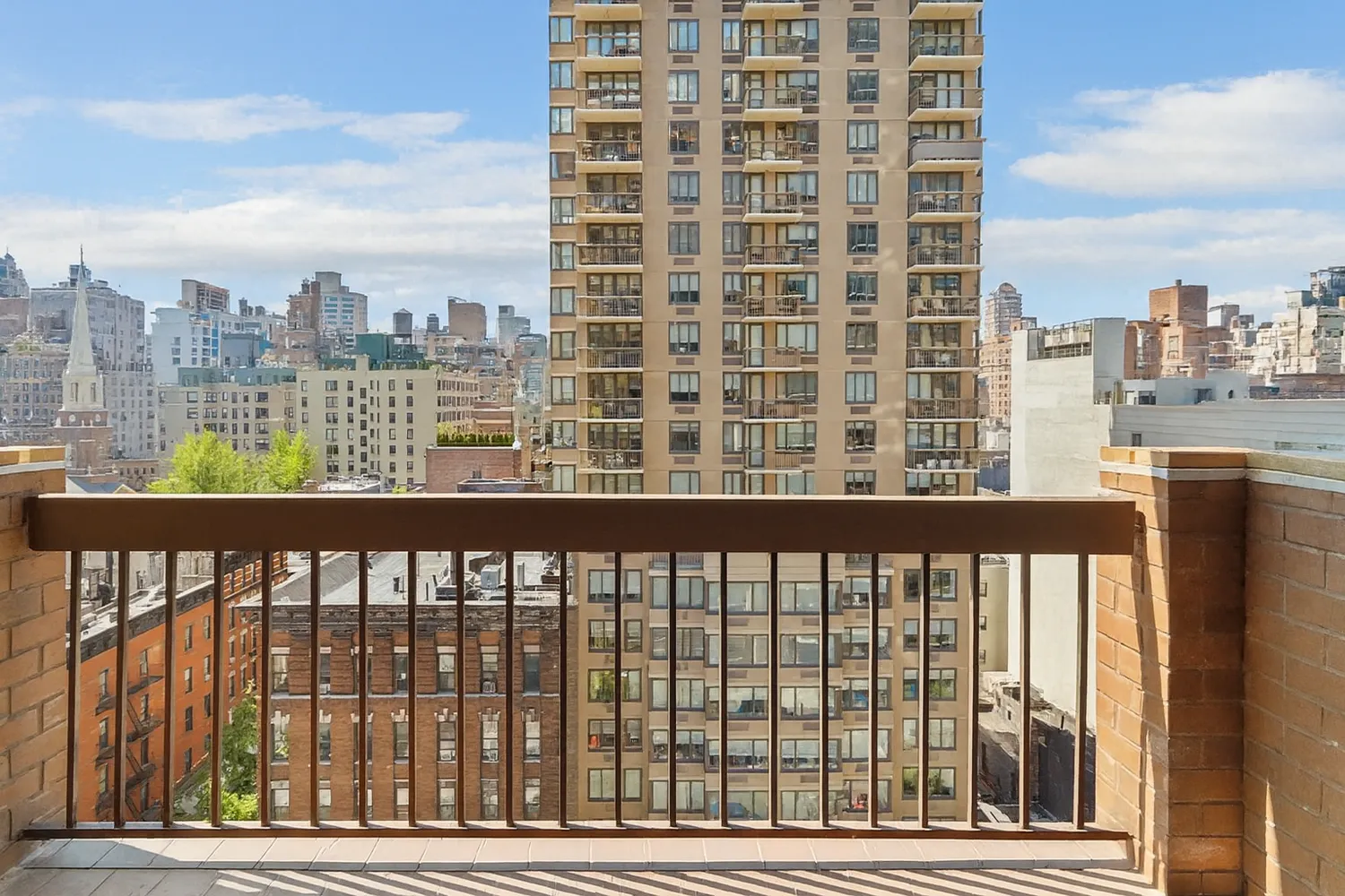 a city view from a balcony