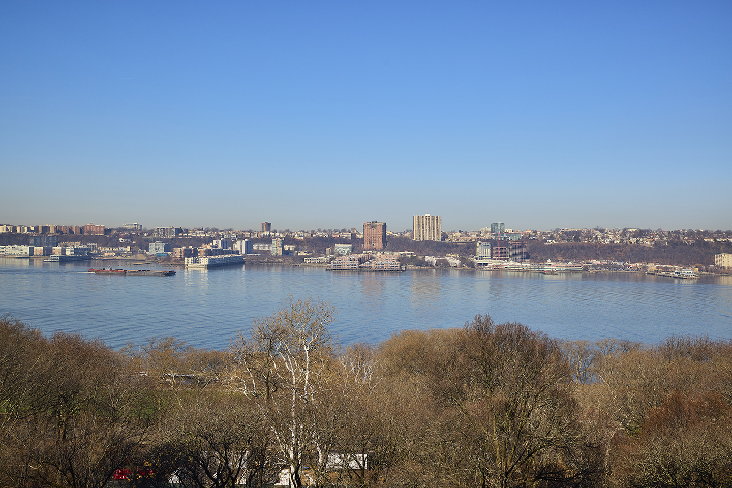 360 Riverside Drive, Unit 8A Manhattan, NY 10025 - Photo 15 of 20 a view of a ocean with boats and trees in the background