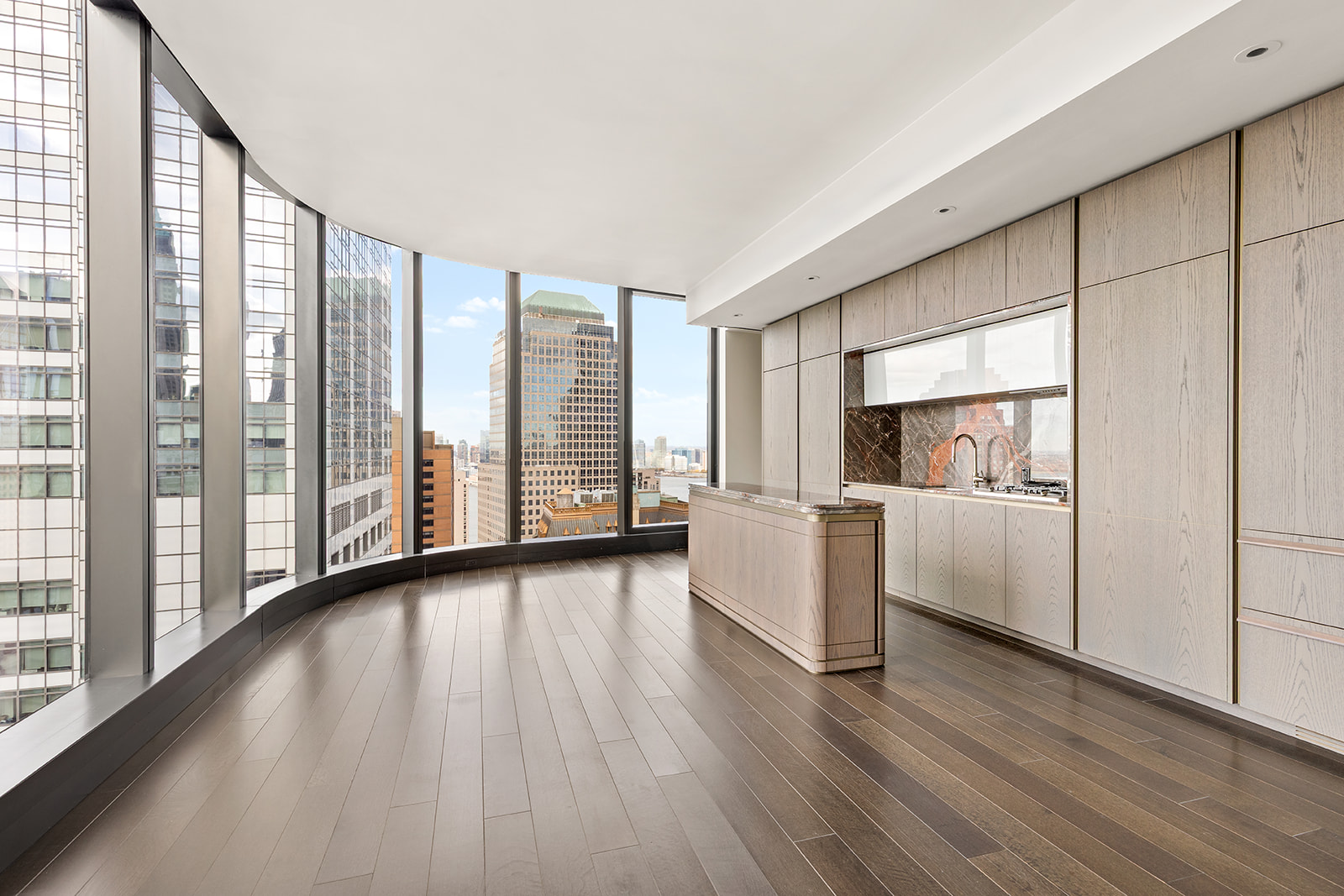 125 Greenwich Street, Unit 37C Manhattan, NY 10006 - Photo 4 of 24 a view of an empty room with wooden floor and a window