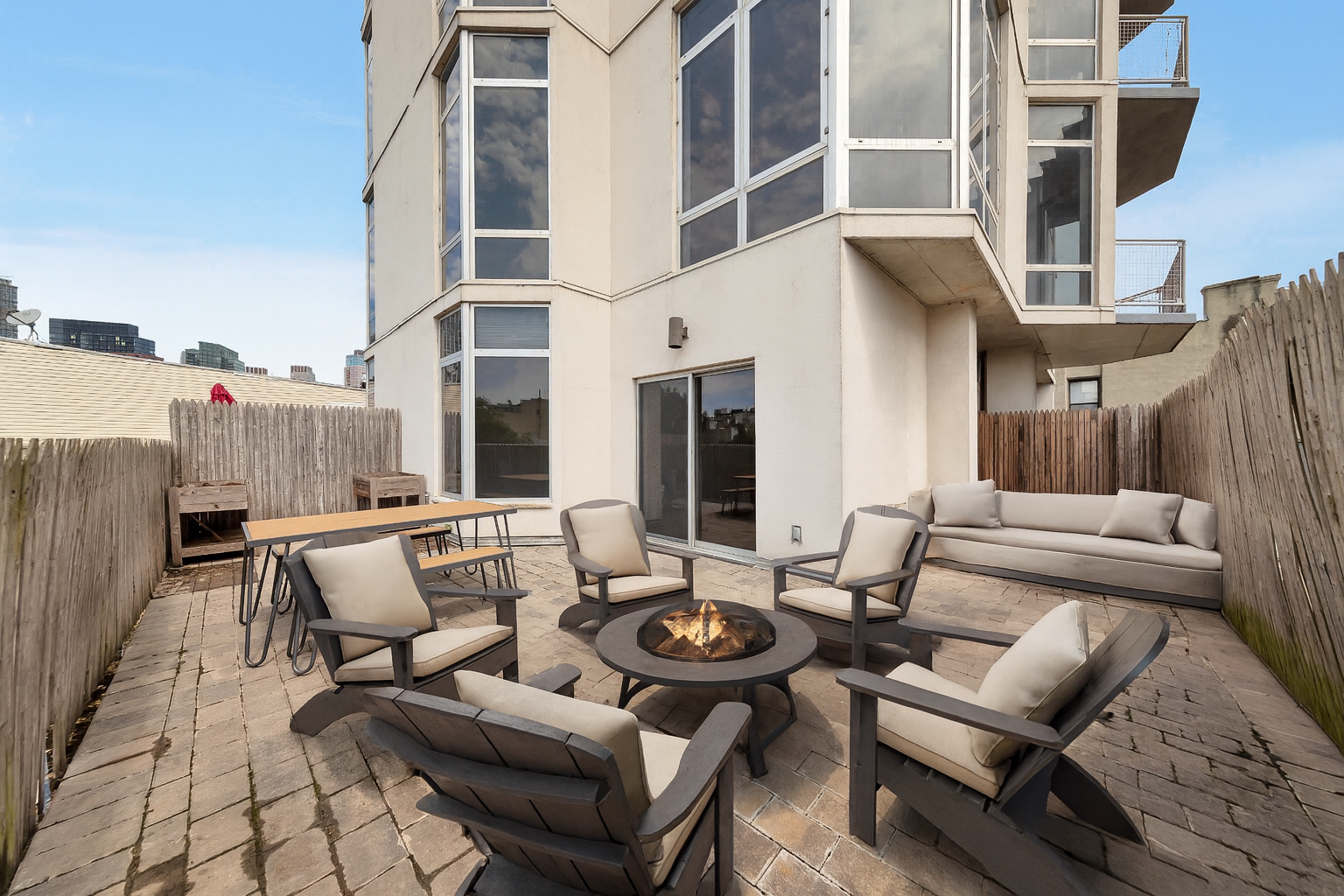 200 Franklin Street, Unit 3B Brooklyn, NY 11222 - Photo 3 of 7 a view of a patio with couches and potted plants