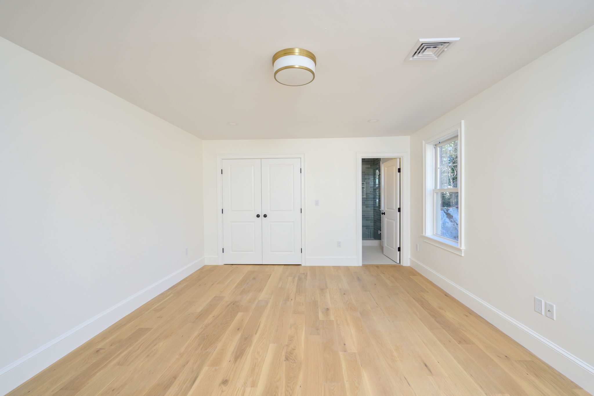 249 Central Avenue Milton, MA 02186 - Photo 34 of 61 a view of room with window and ceiling fan