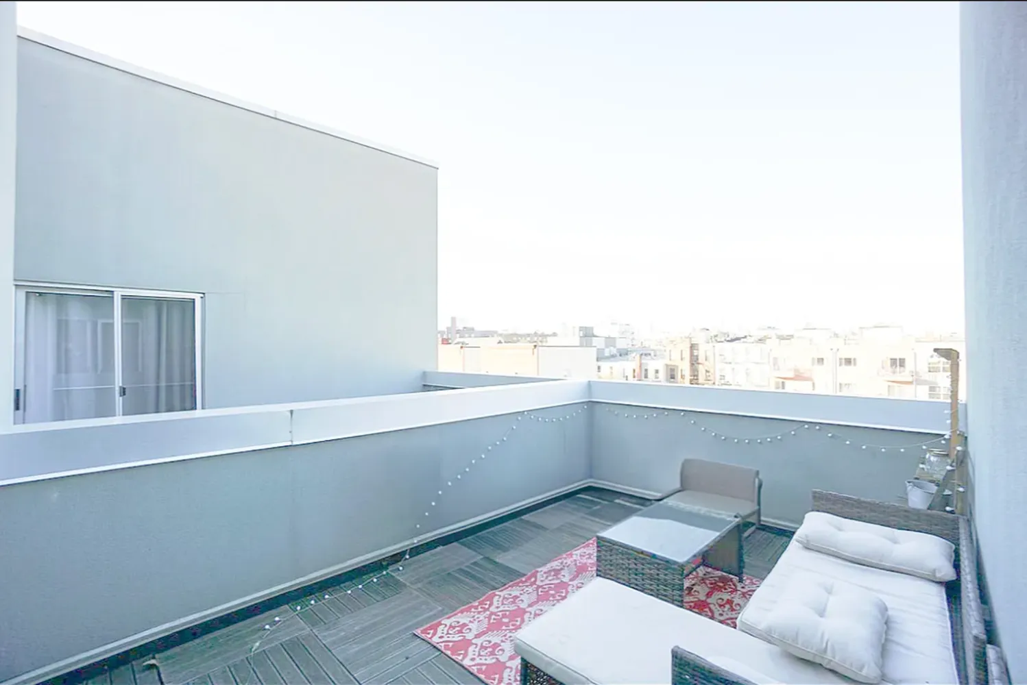 a view of a living room and a window