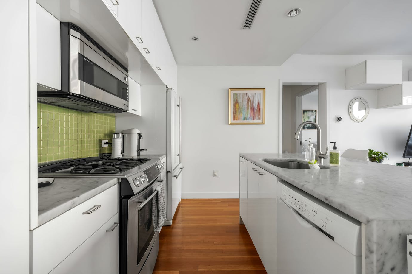 232 7th Street, Unit 2A Brooklyn, NY 11215 - Photo 2 of 8 a kitchen with stainless steel appliances granite countertop a stove and a sink