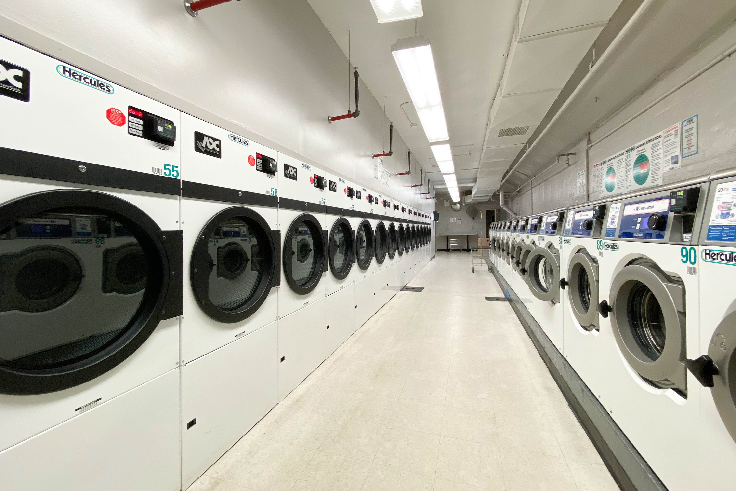 343 East 30th Street, Unit 16D Manhattan, NY 10016 - Photo 11 of 17 a utility room with dryer and washer