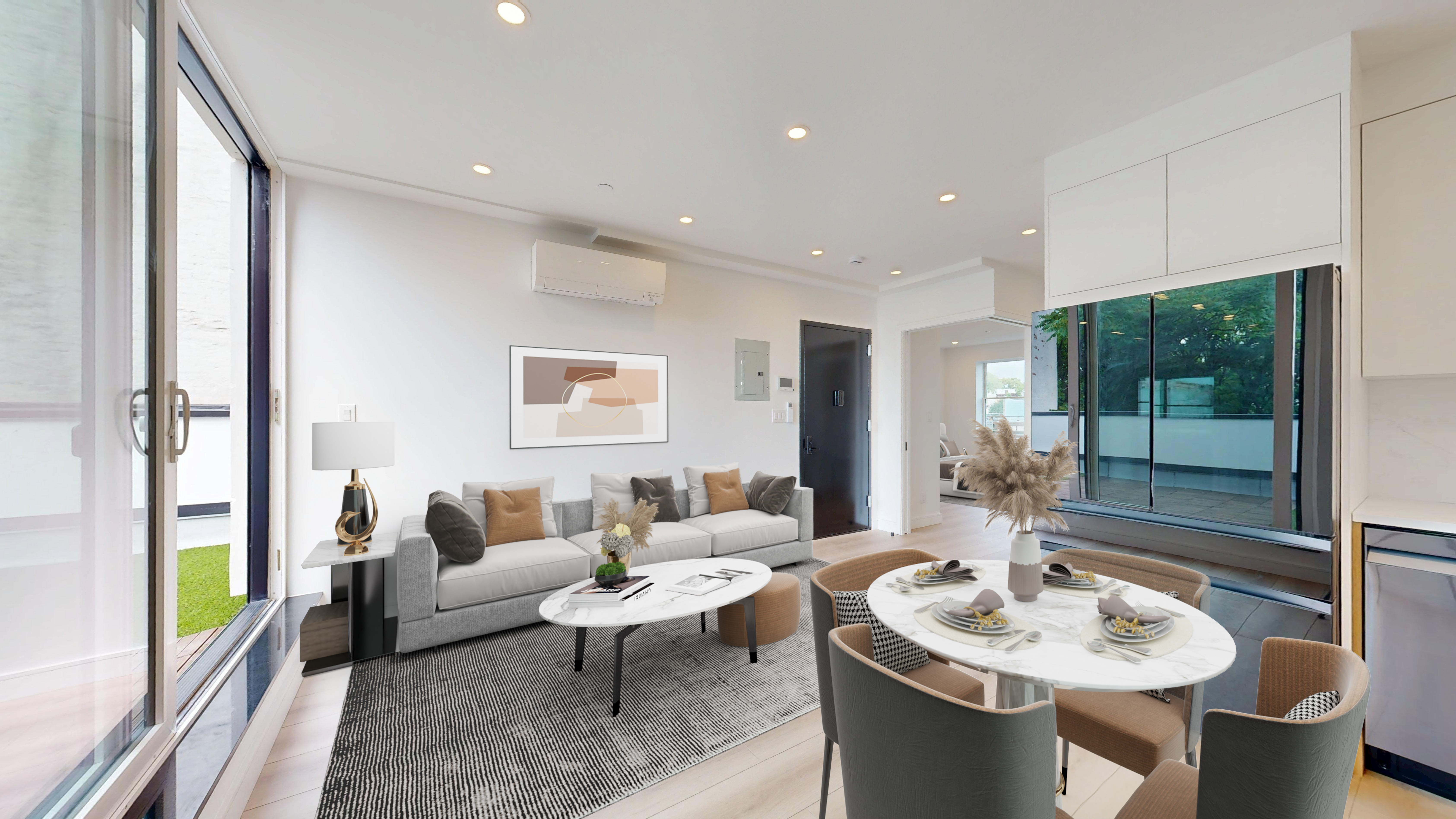 5614 3rd Avenue, Unit 3 Brooklyn, NY 11220 - Photo 2 of 11 a living room with furniture and a table