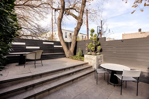 a view of a tables and chairs on the deck