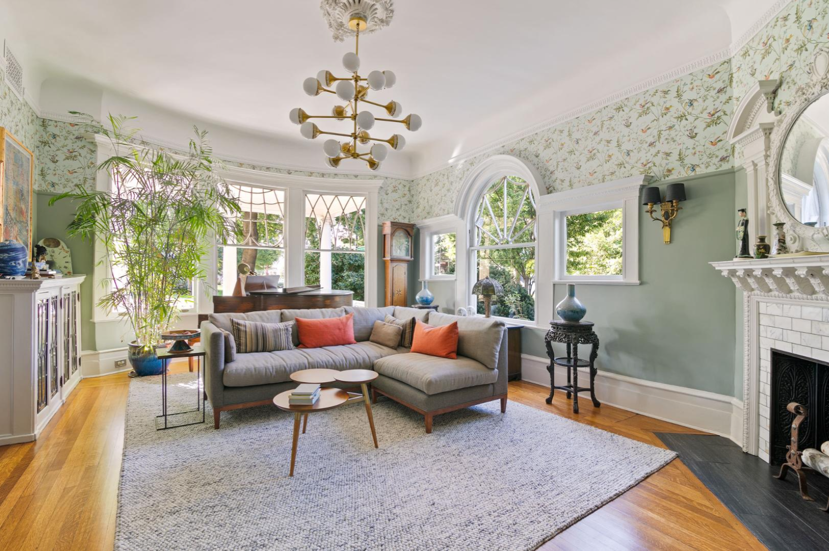 1305 Albemarle Road Brooklyn, NY 11226 - Photo 15 of 38 a living room with furniture chandelier and a fireplace