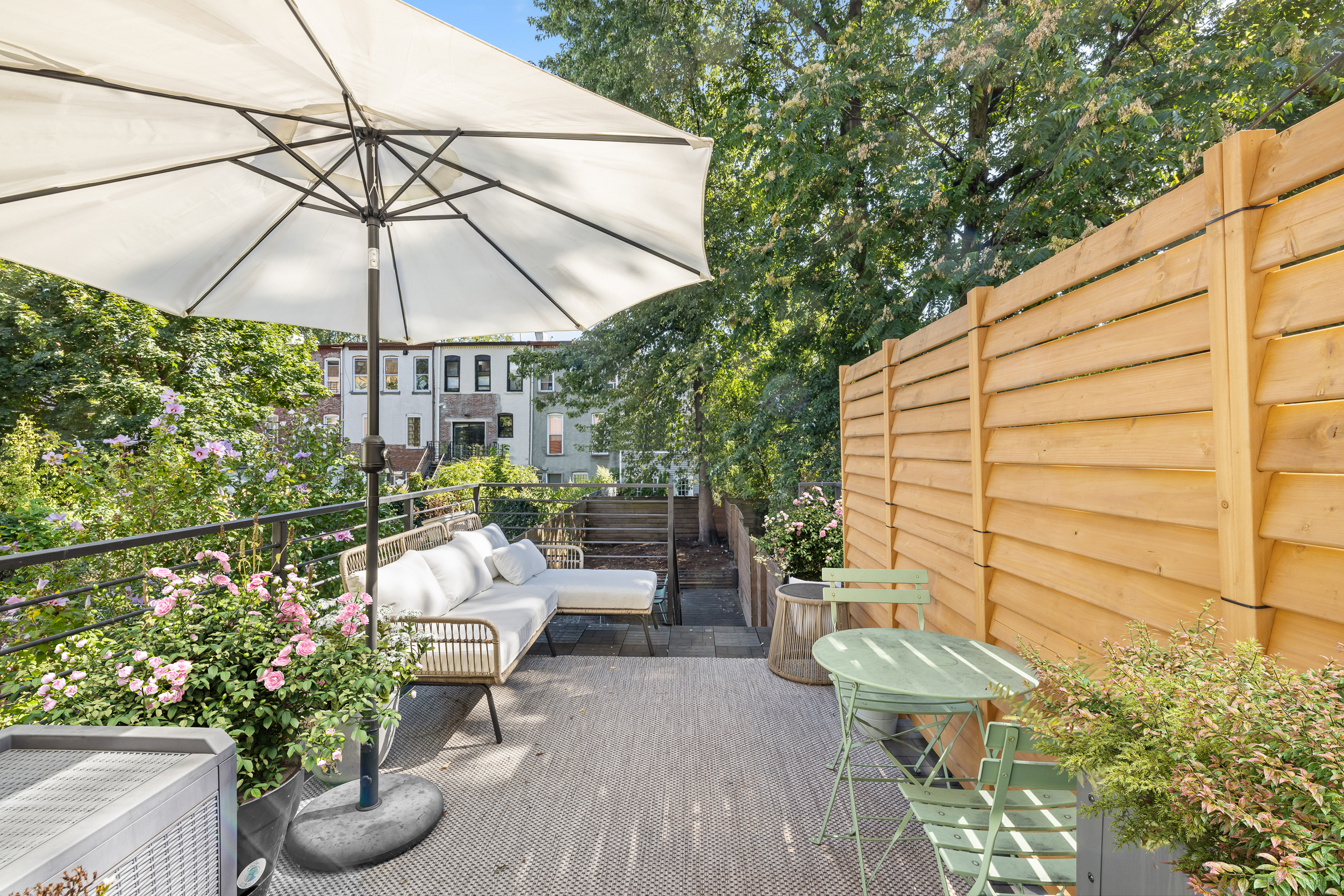 716 Monroe Street Brooklyn, NY 11221 - Photo 7 of 22 a view of a patio with couches and potted plants
