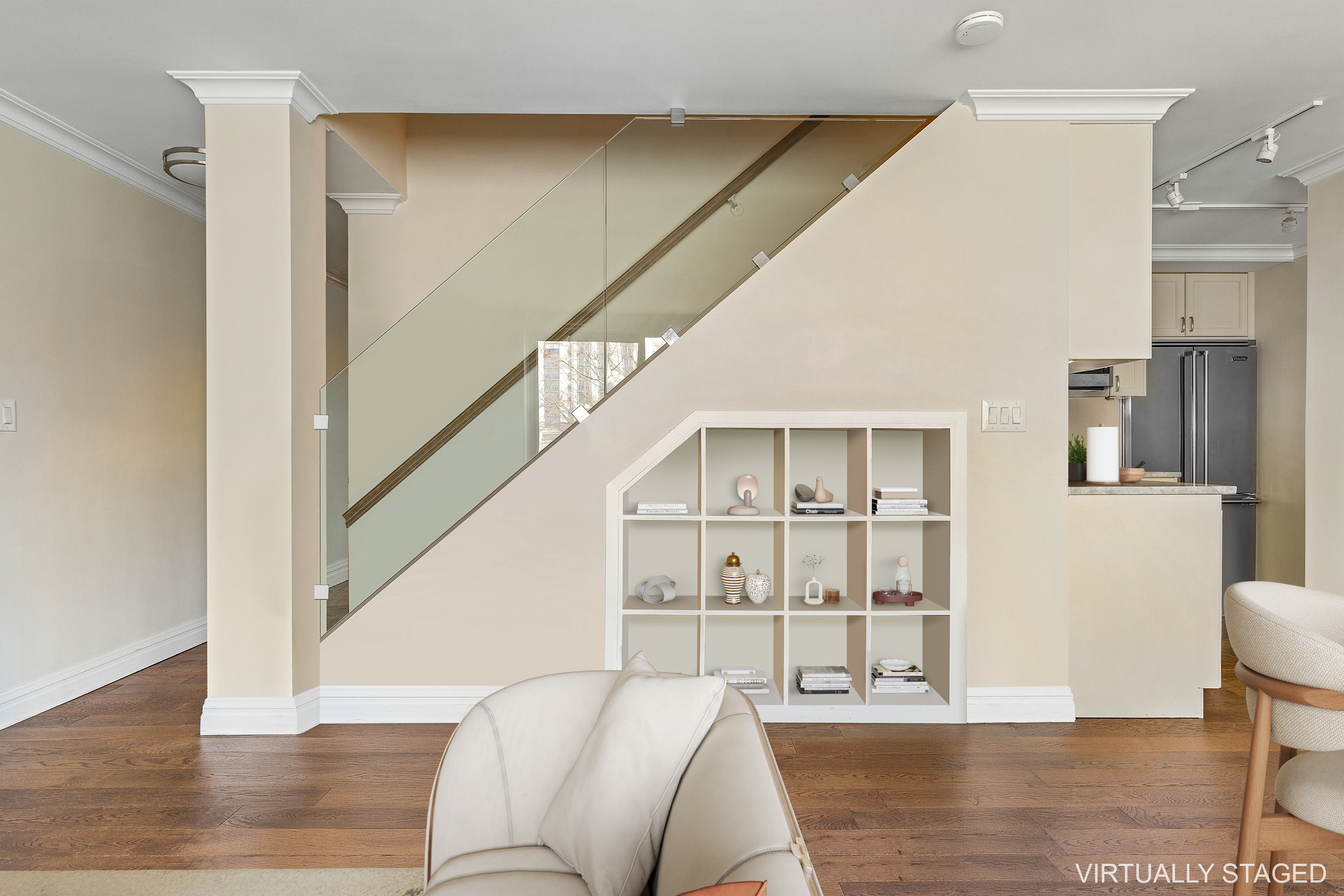 551 Main Street, Unit 208 Manhattan, NY 10044 - Photo 9 of 36 a living room with furniture and a wooden floor