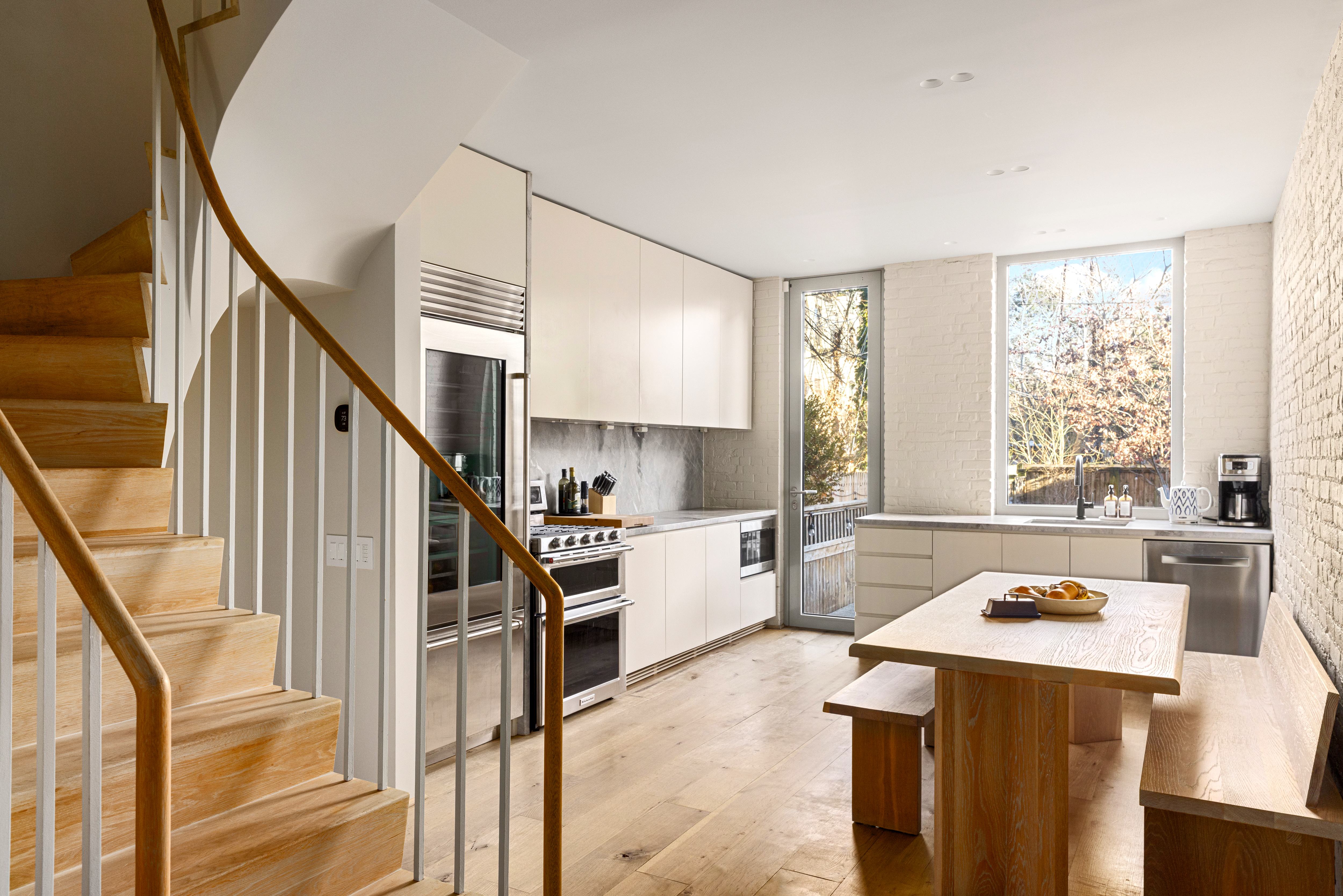 159 Hoyt Street Brooklyn, NY 11217 - Photo 2 of 18 a kitchen that has a sink a stove top oven and cabinetry