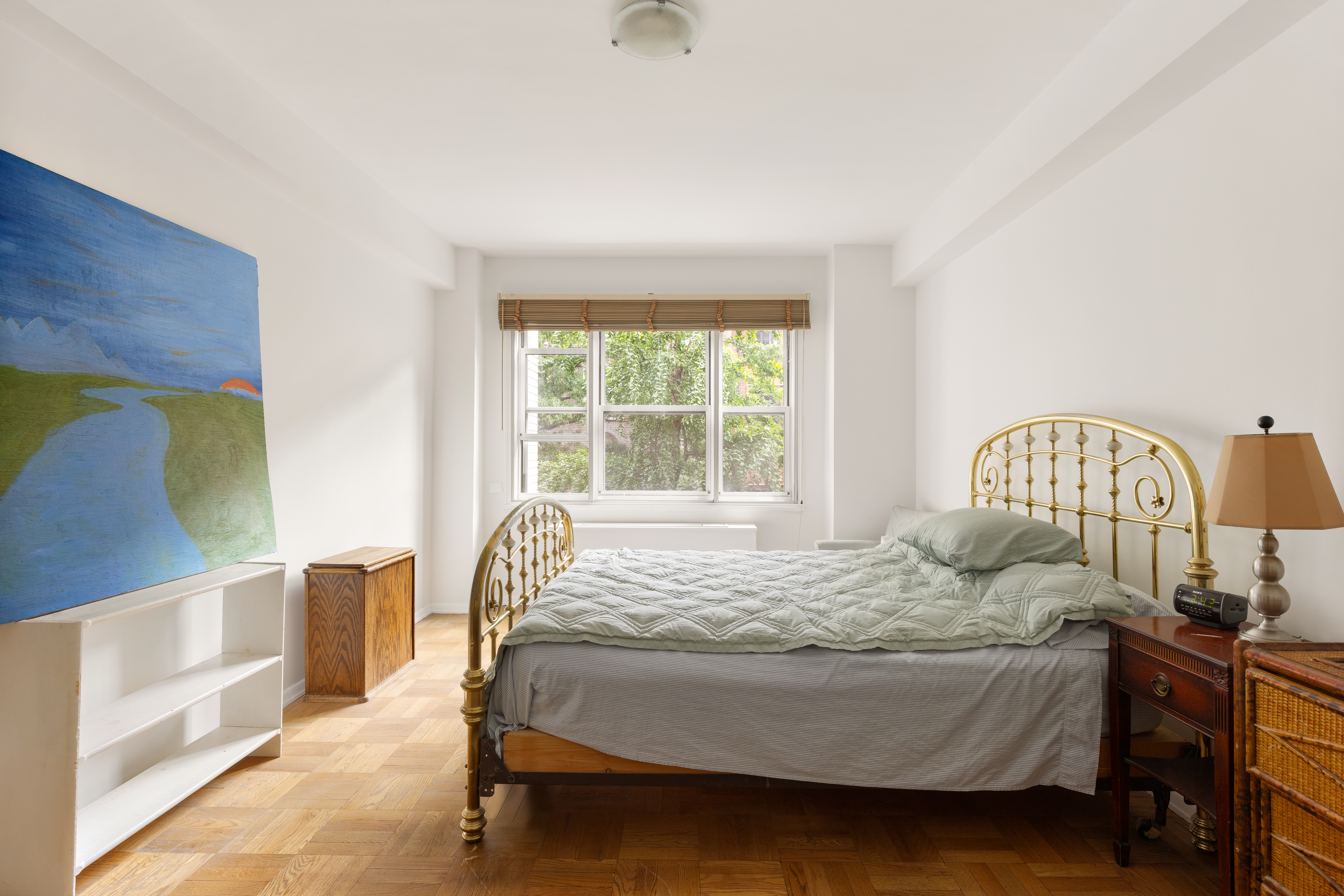 11 5th Avenue, Unit 3R Manhattan, NY 10003 - Photo 7 of 12 a bedroom with a bed and window