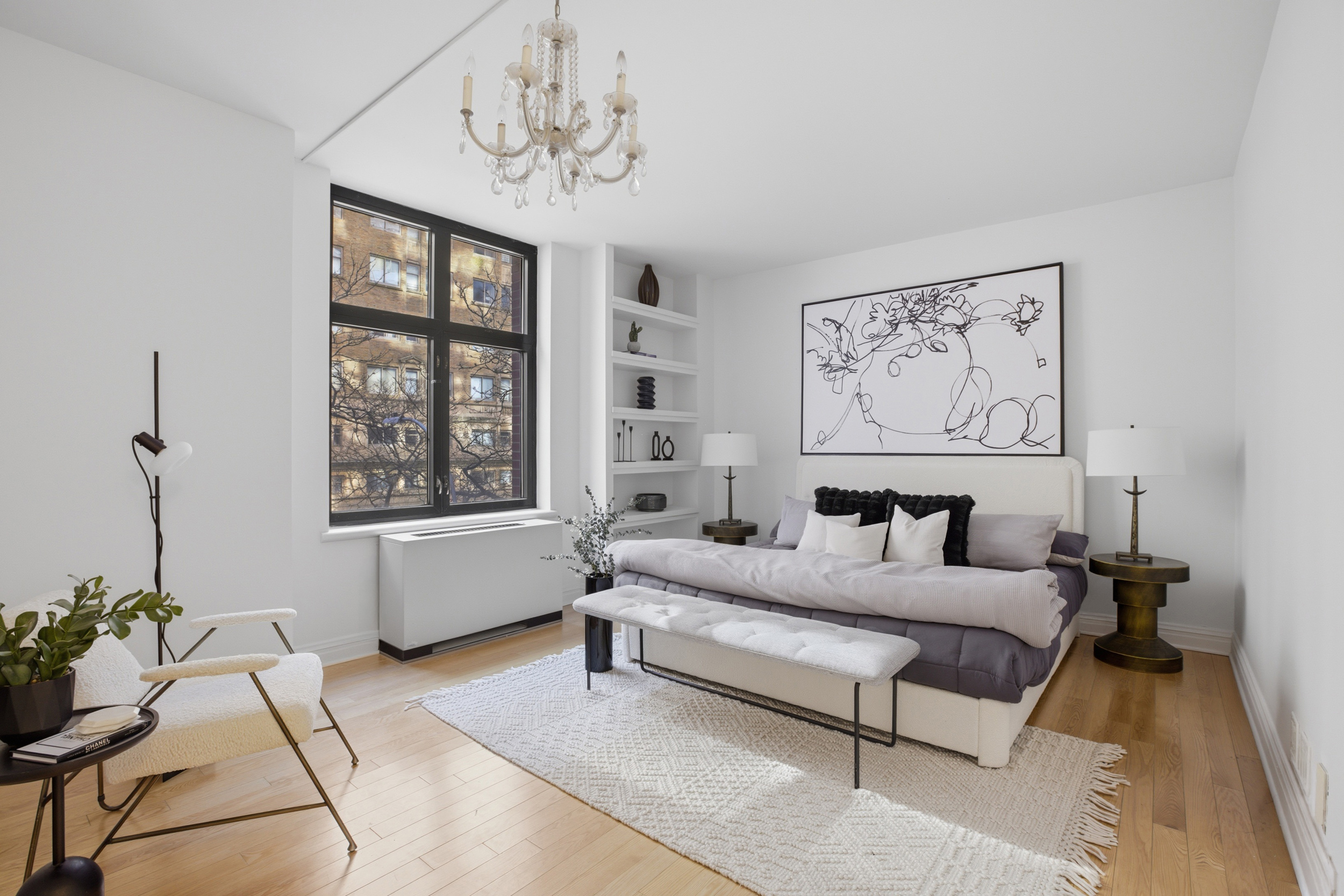 188 East 70th Street, Unit 3A Manhattan, NY 10021 - Photo 8 of 18 a living room with furniture and a window