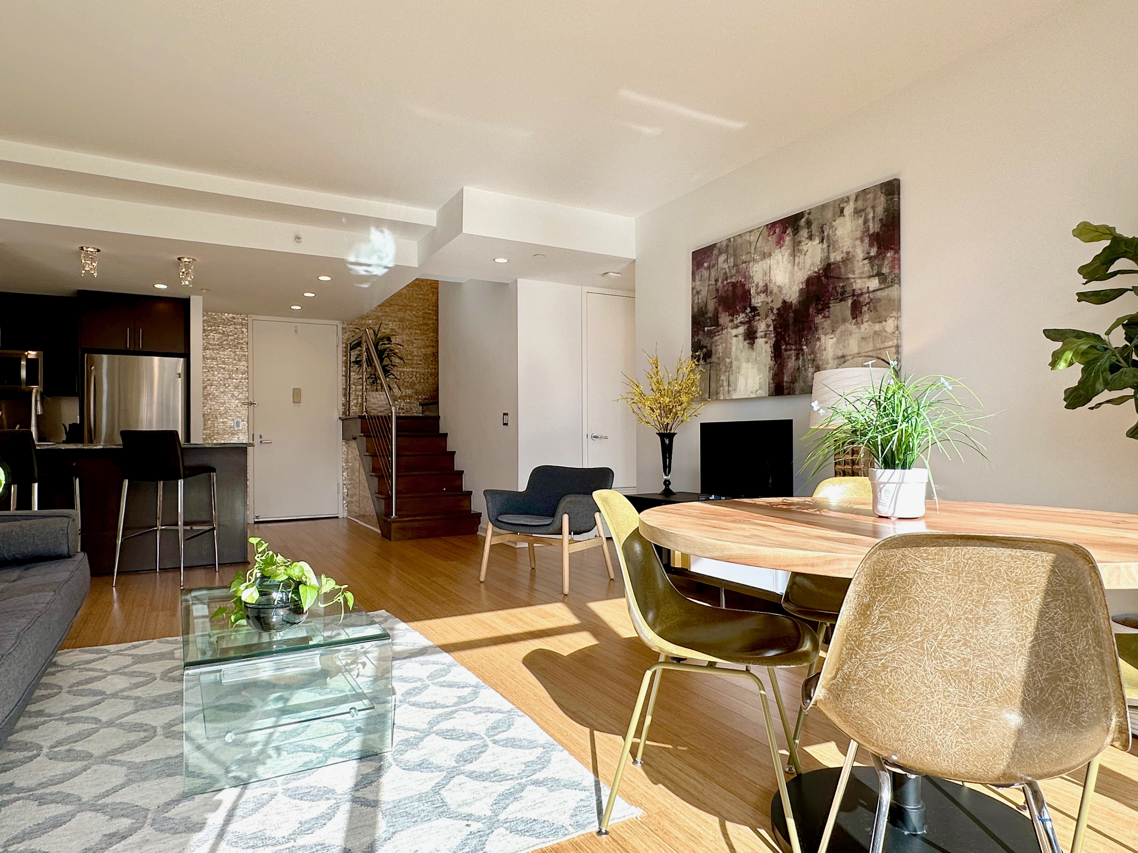 350 West 53rd Street, Unit PHA Manhattan, NY 10019 - Photo 5 of 35 a living room with furniture and a fireplace