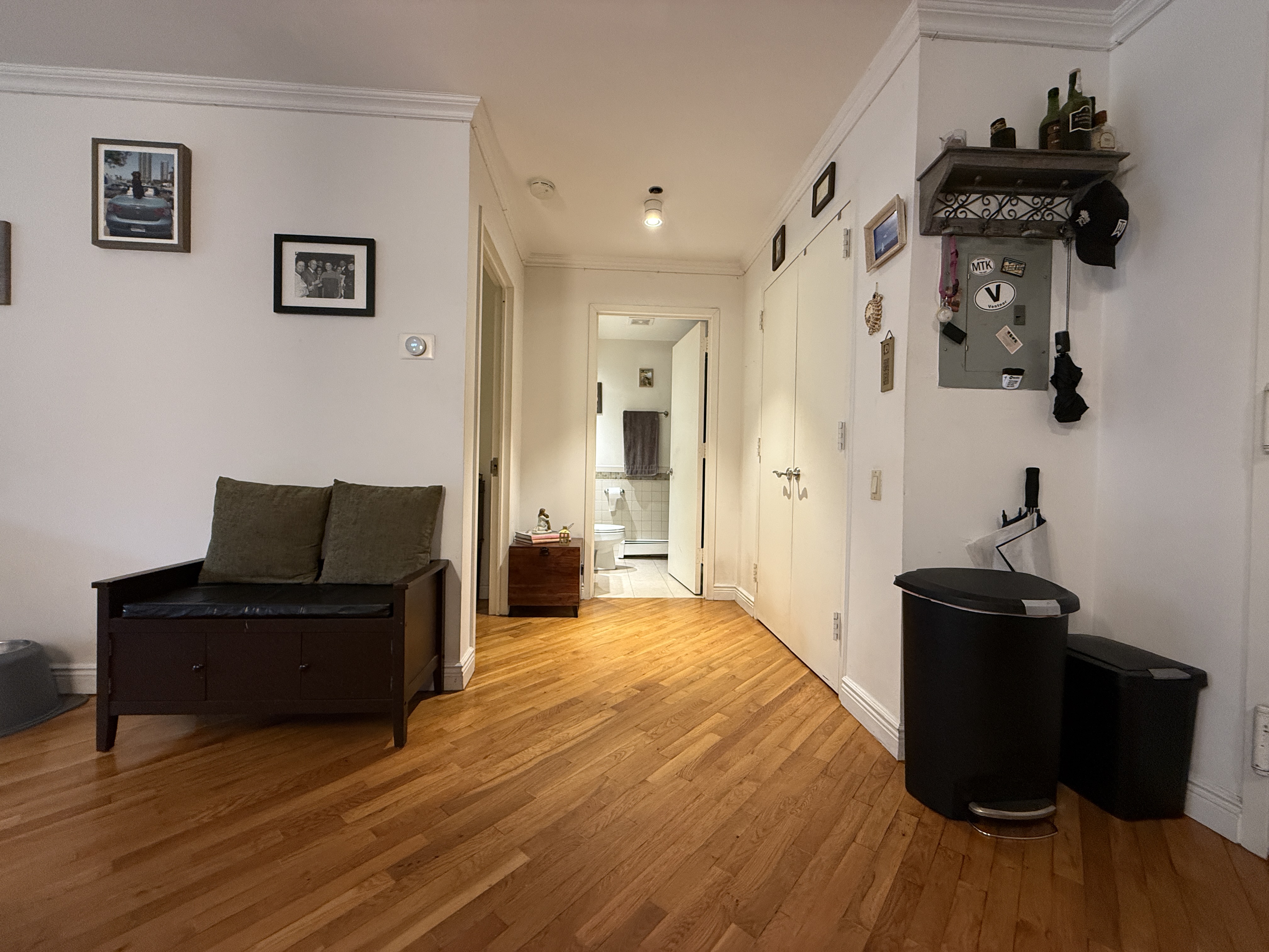 101 Prospect Park Southwest, Unit 3B Brooklyn, NY 11218 - Photo 10 of 23 a living room with a bed and furniture