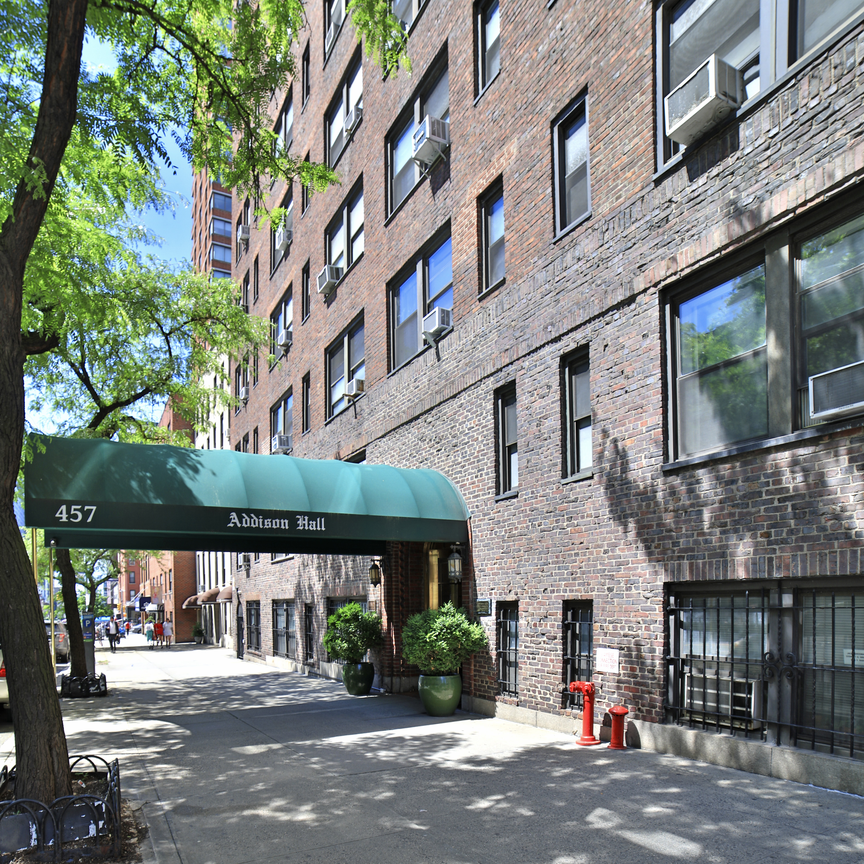 457 West 57th Street, Unit 108 Manhattan, NY 10019 - Photo 7 of 8 a view of a building with a street