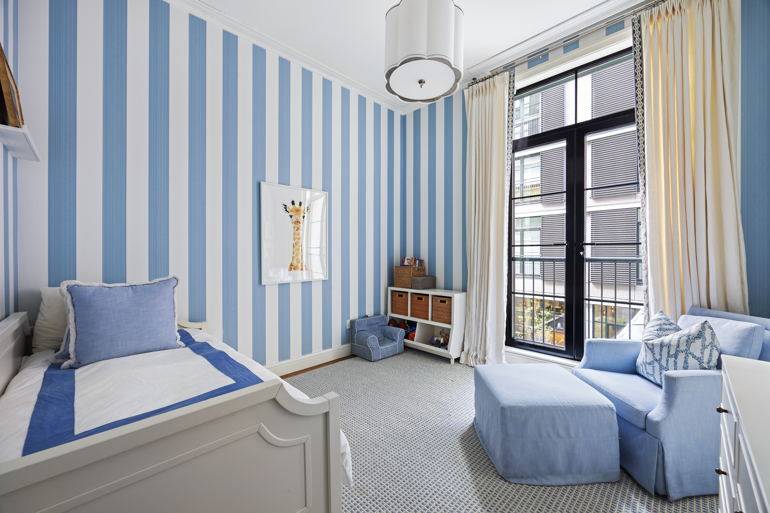 71 Laight Street, Unit 2F Manhattan, NY 10013 - Photo 12 of 20 a bedroom with furniture and large windows