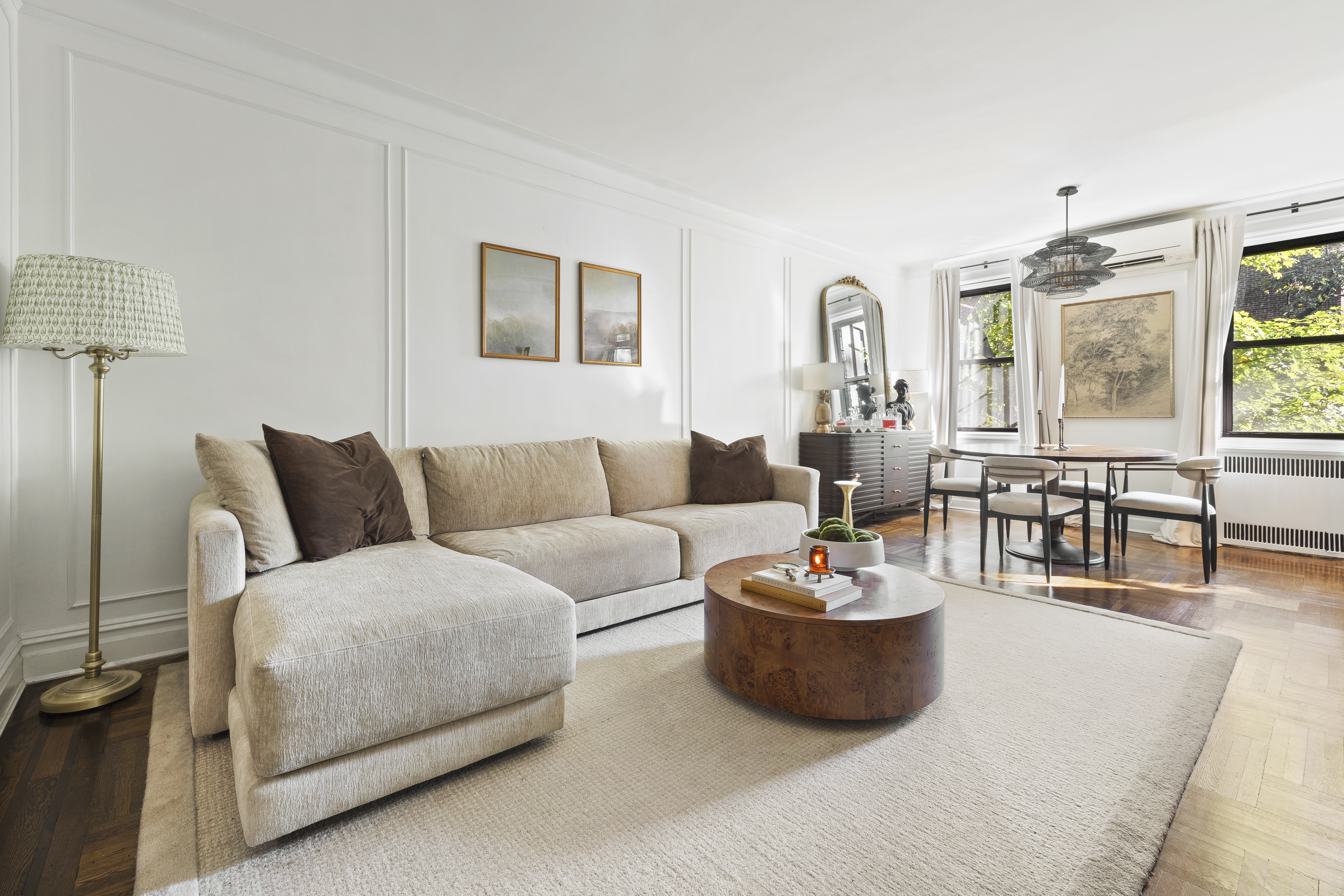125 Ocean Avenue, Unit 2G Brooklyn, NY 11225 - Photo 1 of 16 a living room with furniture and a large window
